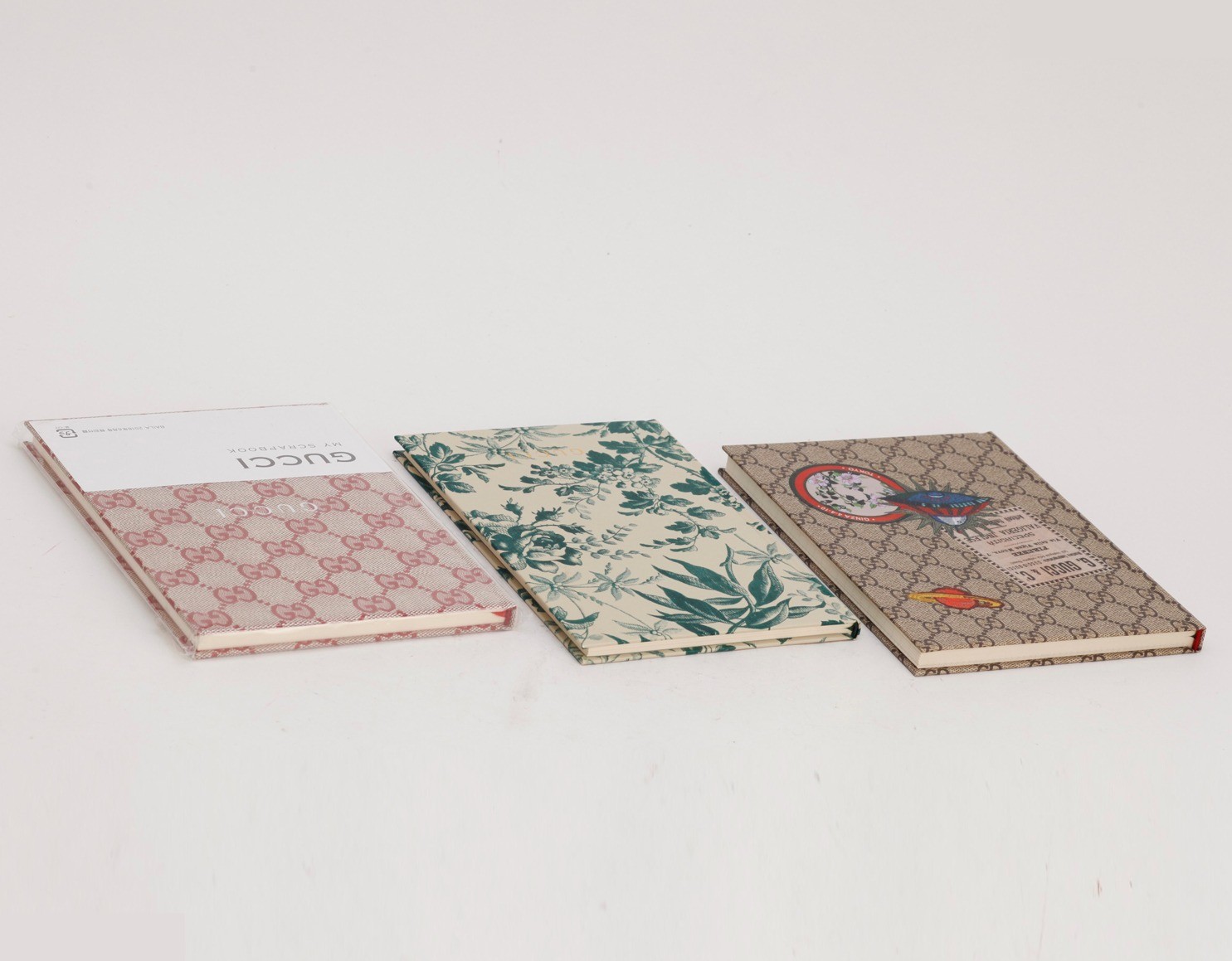 Three notebooks and a novelty item. — view 3