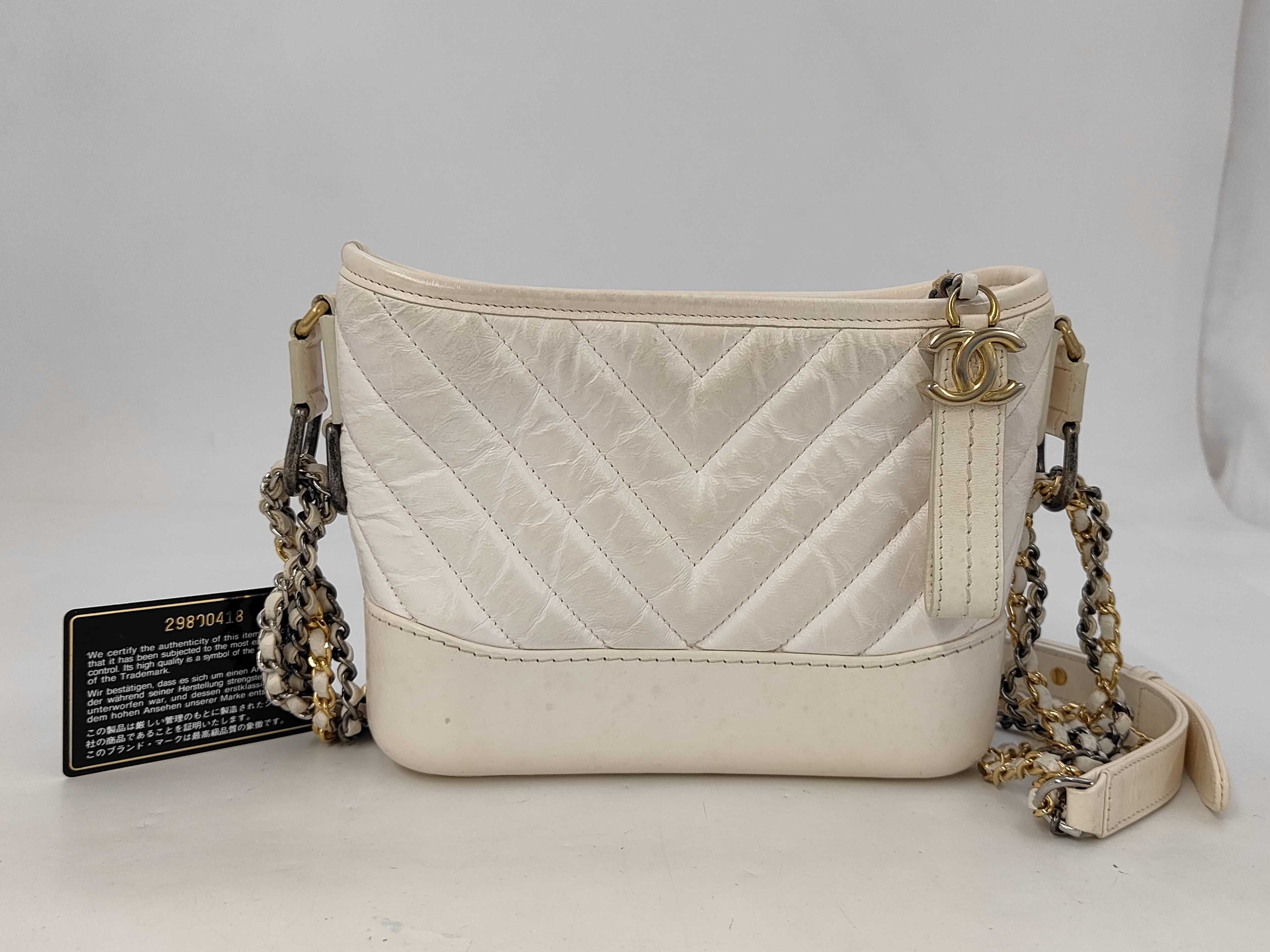 Gabrielle de Small, serial number 29, calfskin, white, gold and silver hardware, shoulder bag