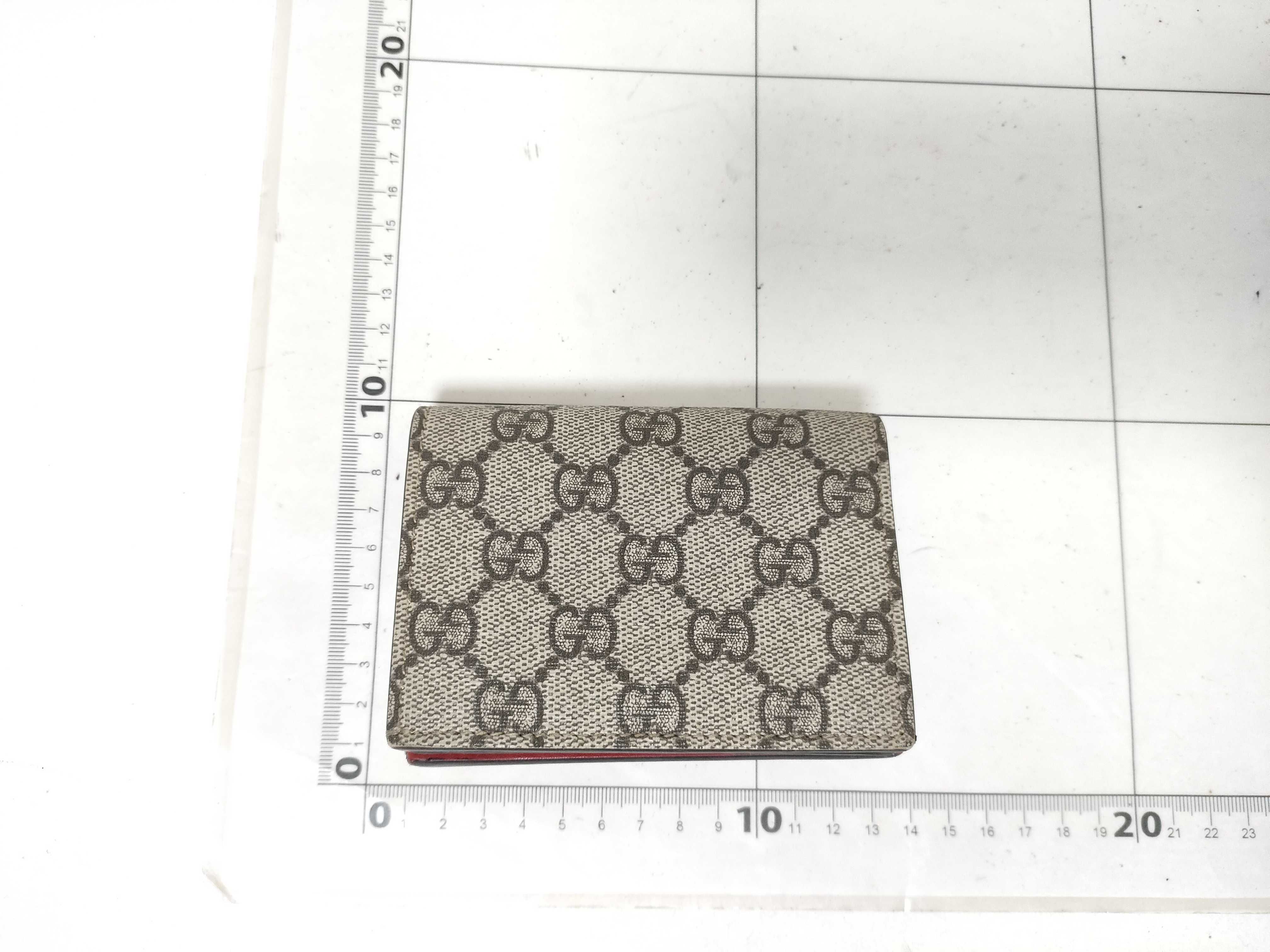 GG Supreme Bi-fold Wallet (476050/525040) - Interlocking G pattern, PVC, Cherry color, Brown tones. Includes box and dust bag. — view 2