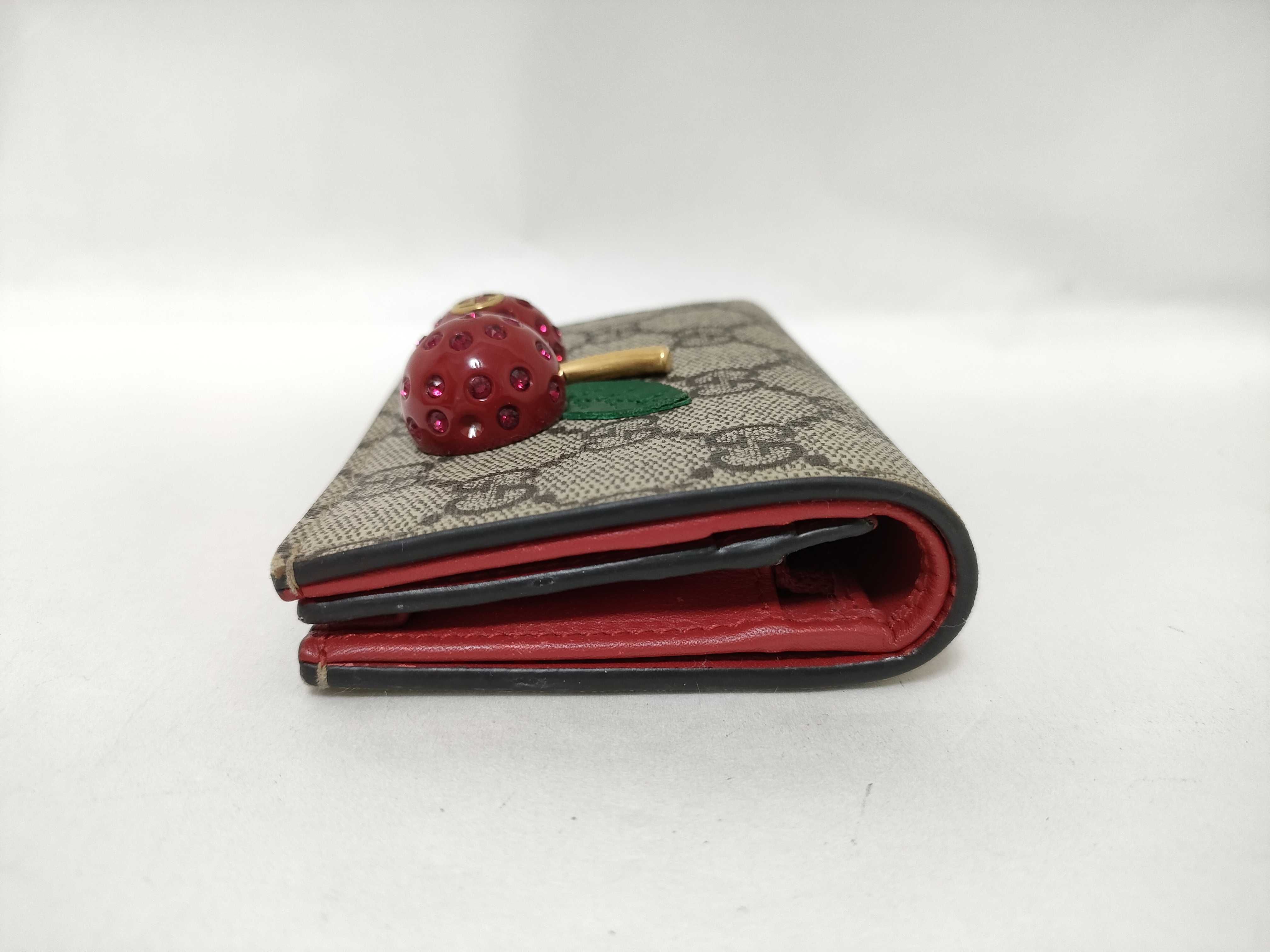 GG Supreme Bi-fold Wallet (476050/525040) - Interlocking G pattern, PVC, Cherry color, Brown tones. Includes box and dust bag. — view 3