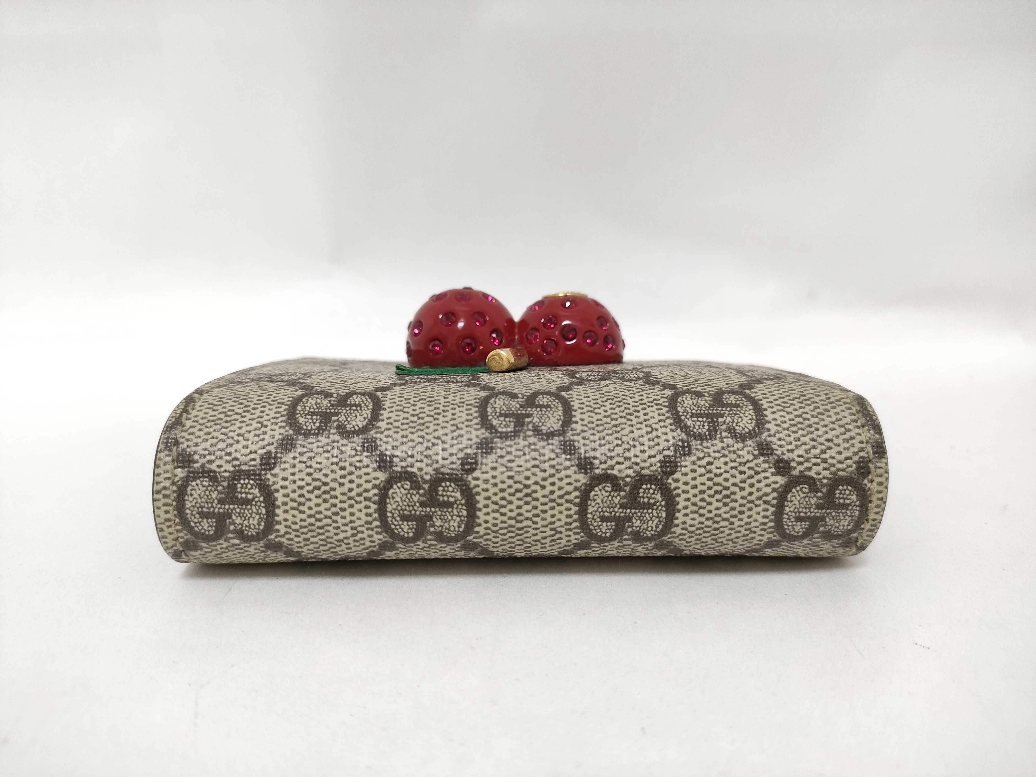 GG Supreme Bi-fold Wallet (476050/525040) - Interlocking G pattern, PVC, Cherry color, Brown tones. Includes box and dust bag. — view 6