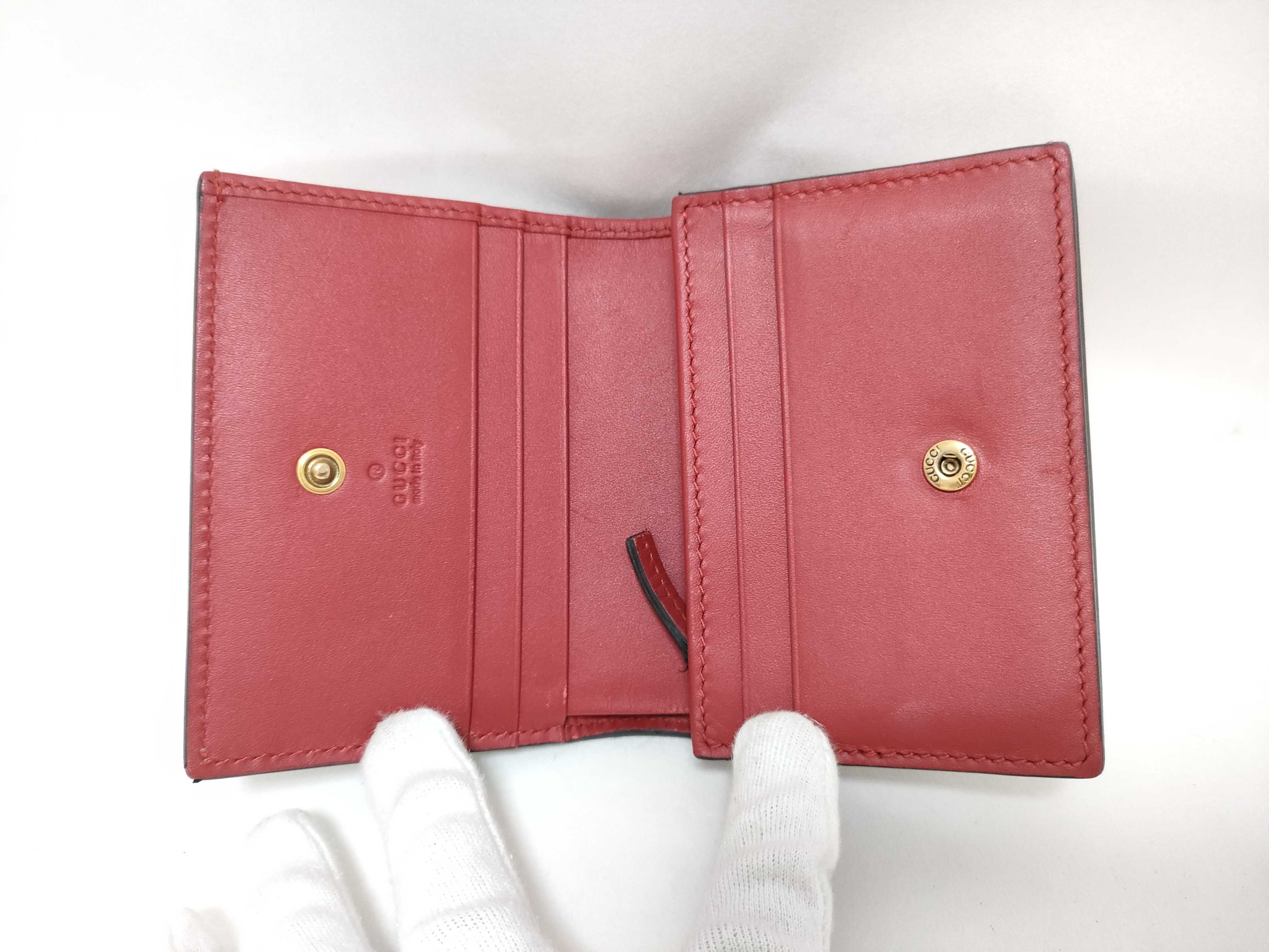 GG Supreme Bi-fold Wallet (476050/525040) - Interlocking G pattern, PVC, Cherry color, Brown tones. Includes box and dust bag. — view 7