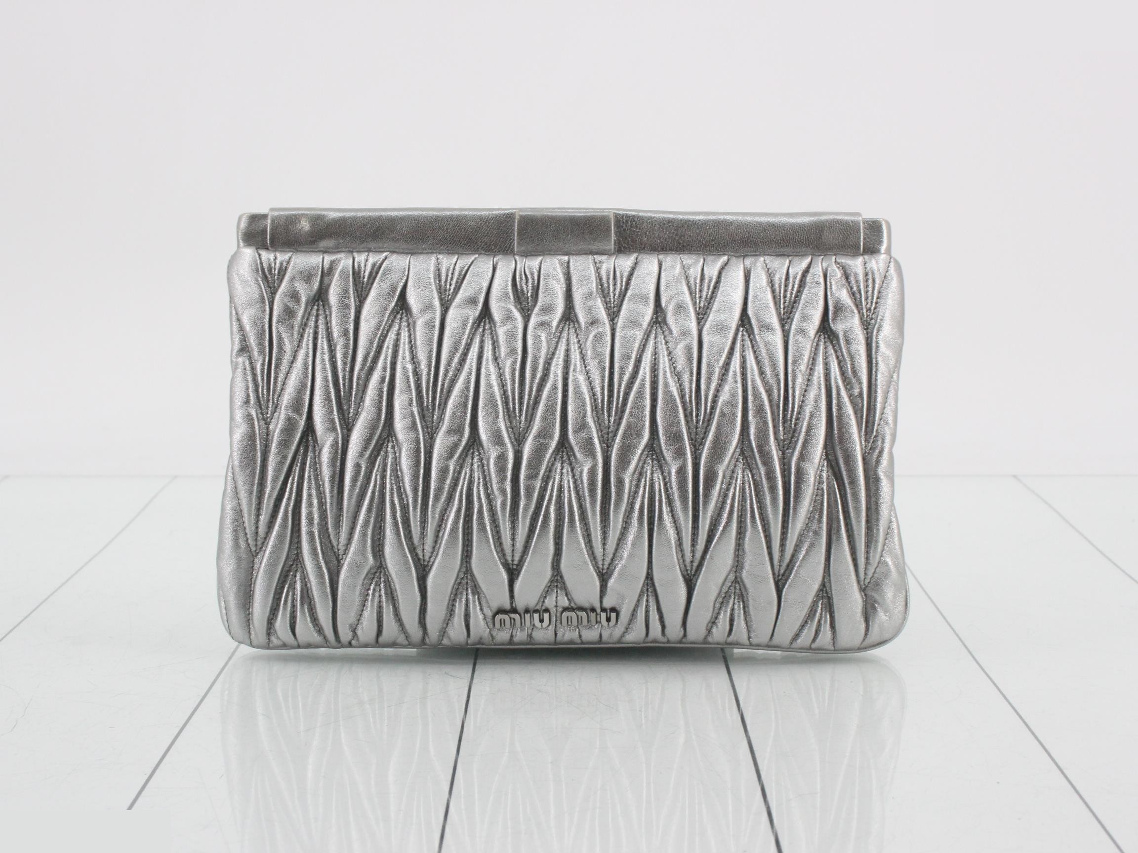 Matelassé Clutch Bag