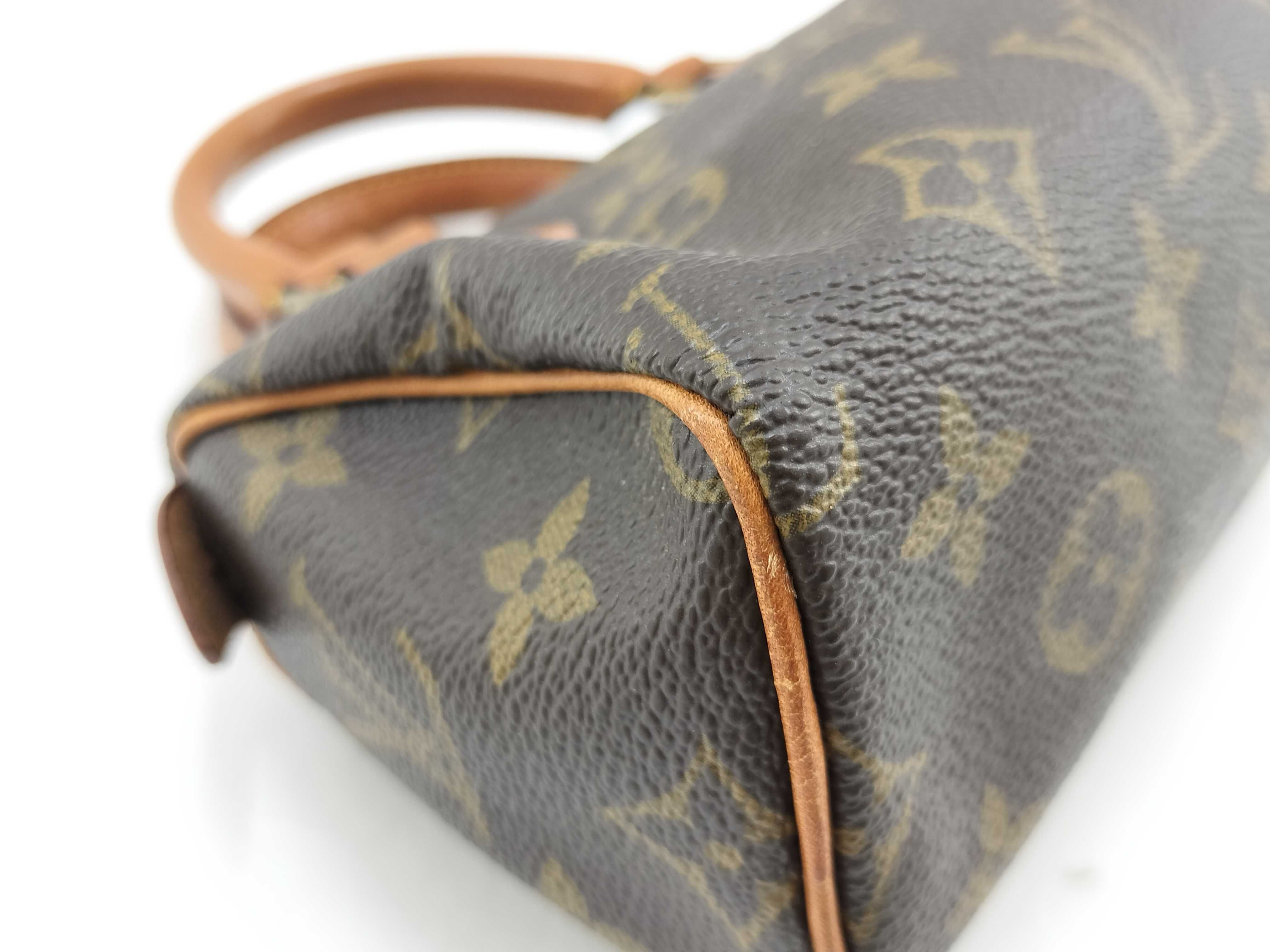Monogram LV Monogram Mini Speedy Handbag with pull tab, no tears. — view 6