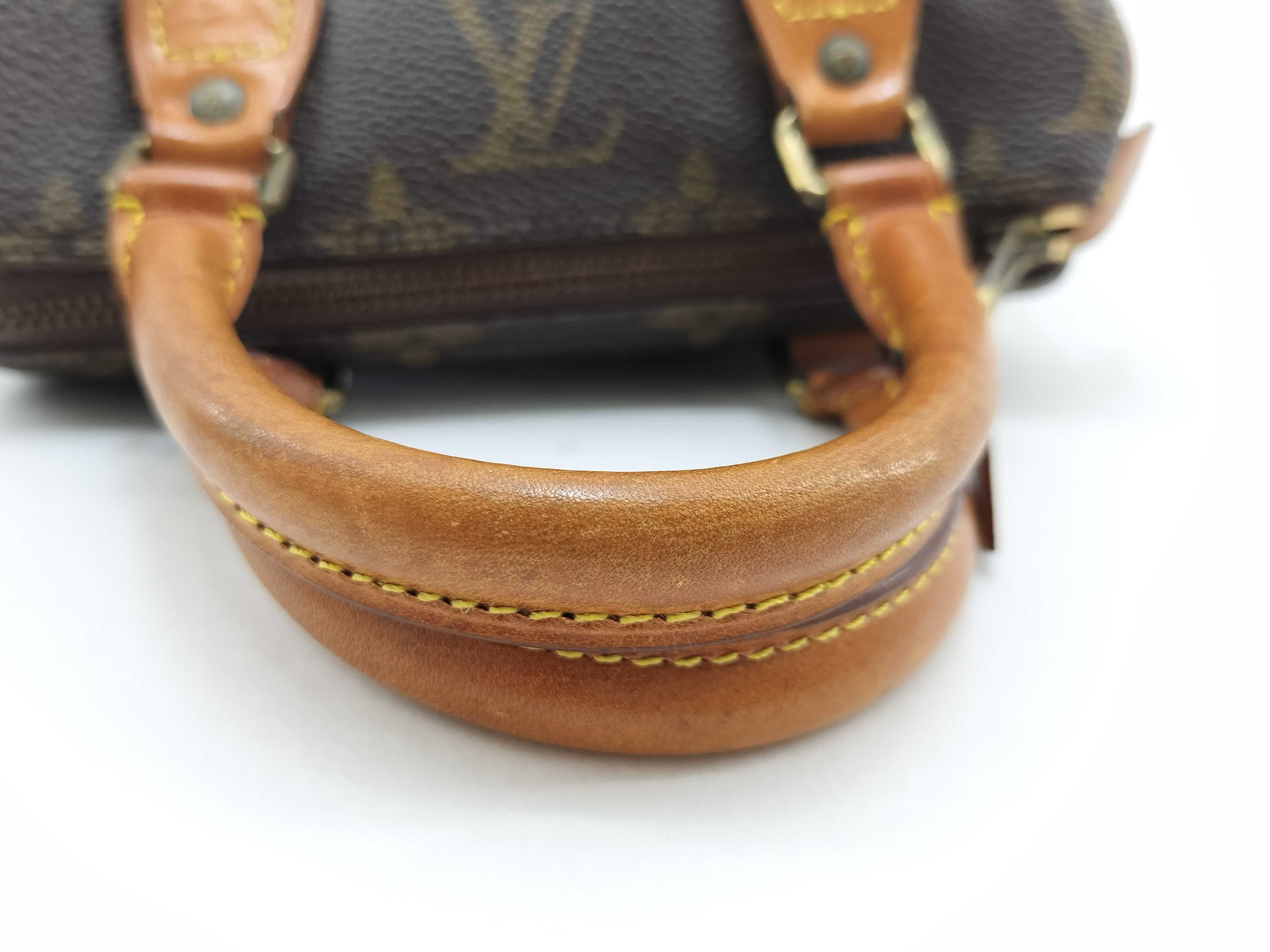 Monogram LV Monogram Mini Speedy Handbag with pull tab, no tears. — view 8