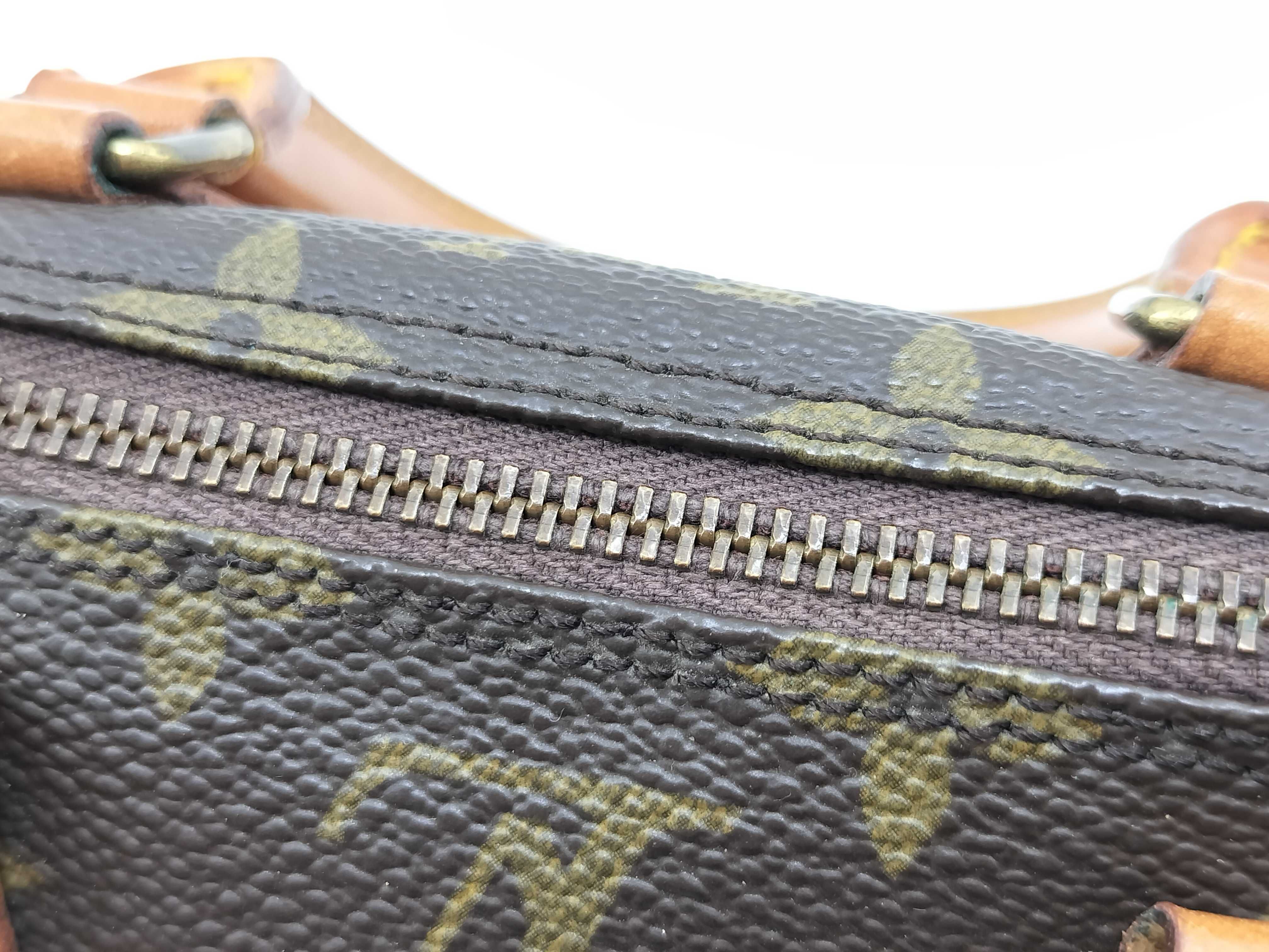 Monogram LV Monogram Mini Speedy Handbag with pull tab, no tears. — view 9