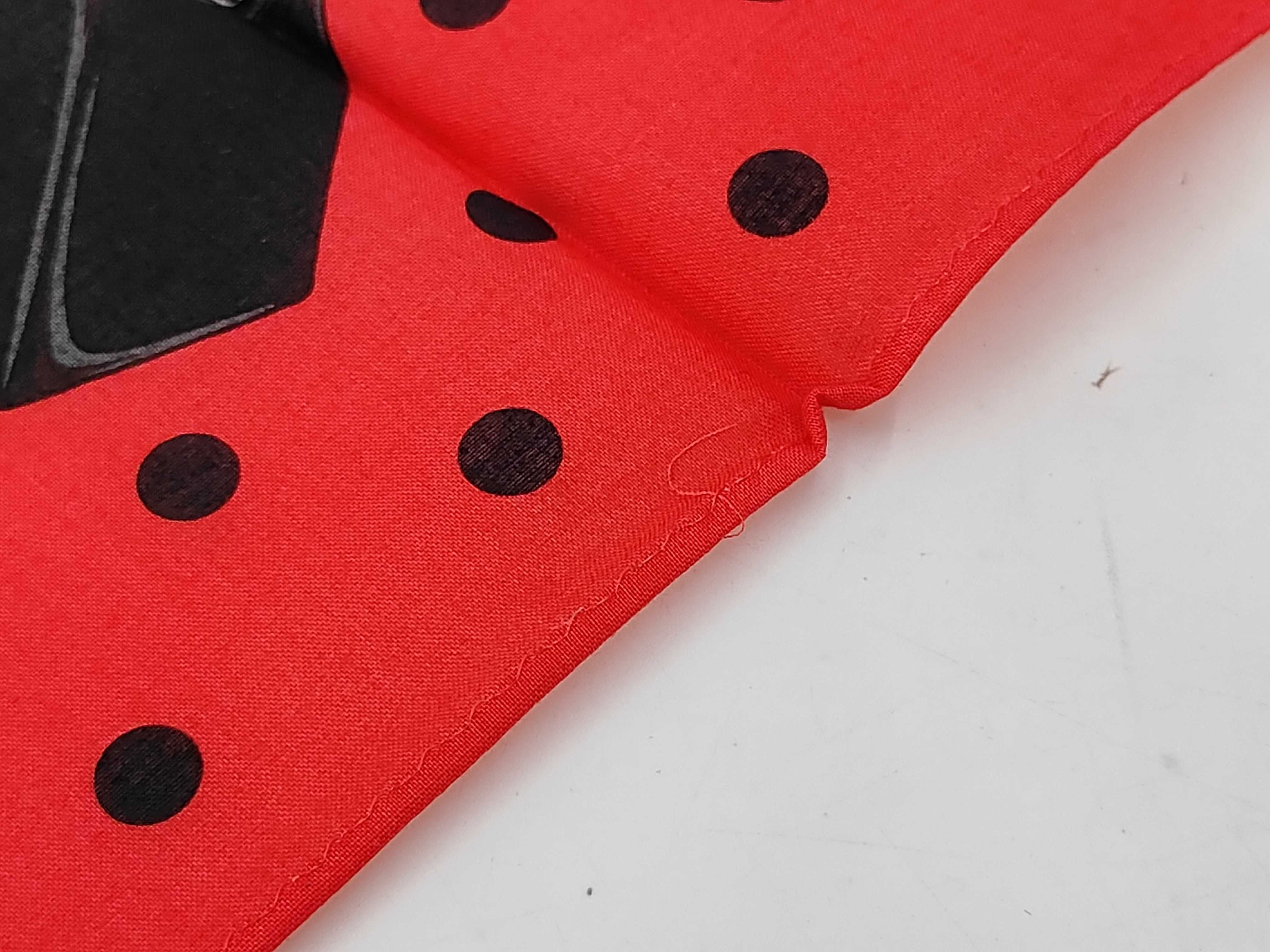 handkerchief scarf with CD logo, bag motif, houndstooth pattern, watch, polka dots, and other accessories. — view 5