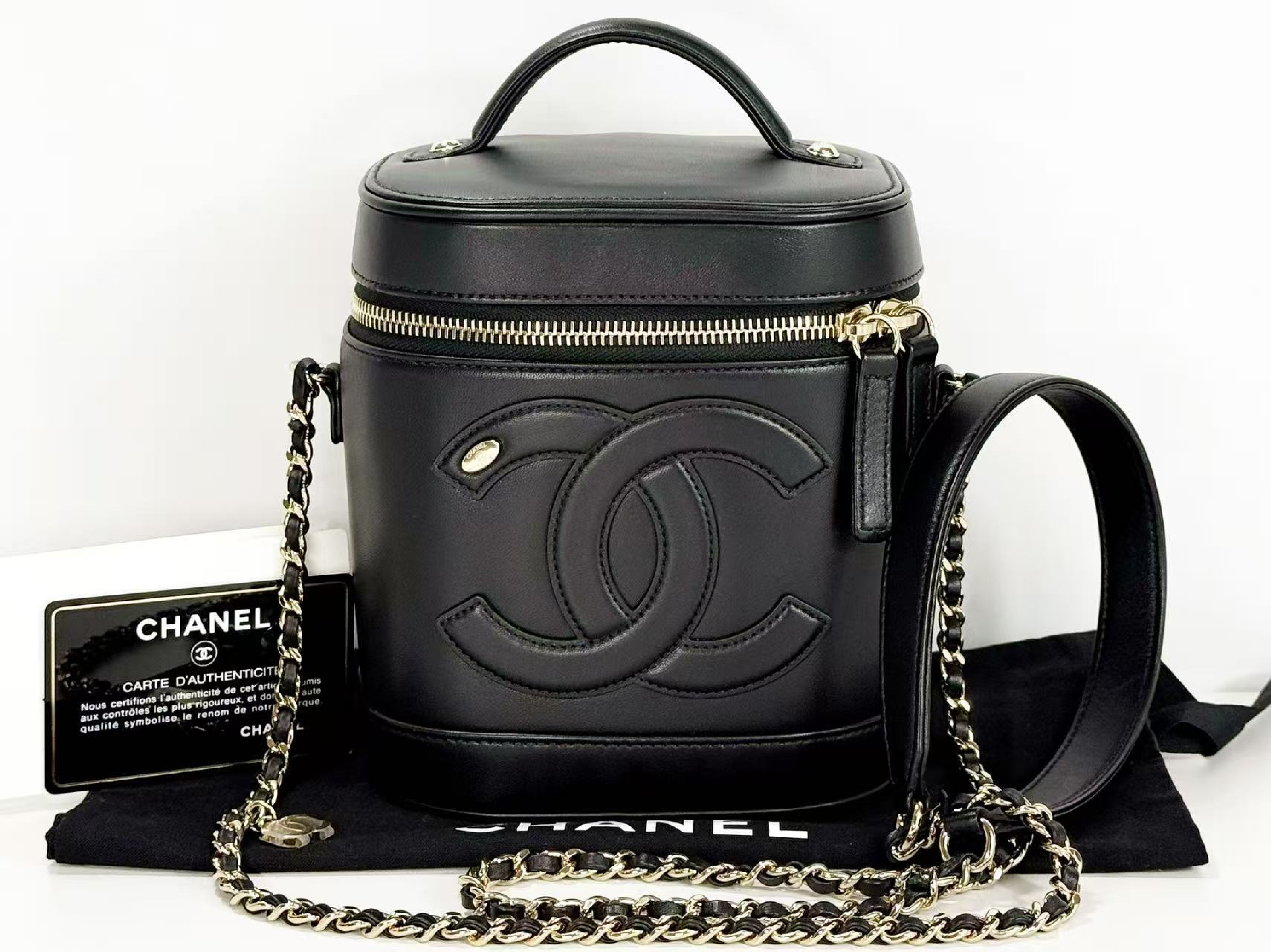 Stored Item, Black, Large Coco Vanity Case, 2-way, W15/H16/D12cm (approx.), Serial Number in the 27s range. Includes dust bag, booklet, authenticity card, and sticker. Gold hardware. Handbag/Shoulder bag. Item Number: 27488316.