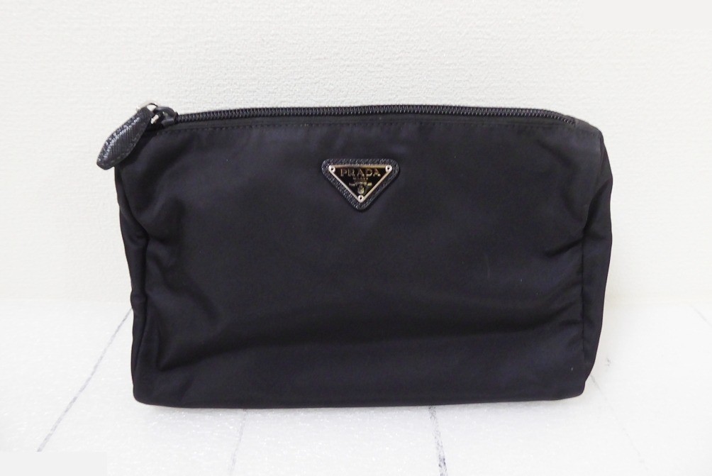 Other items: Bags, pouches, cosmetic pouches, guarantee card (with stamp)