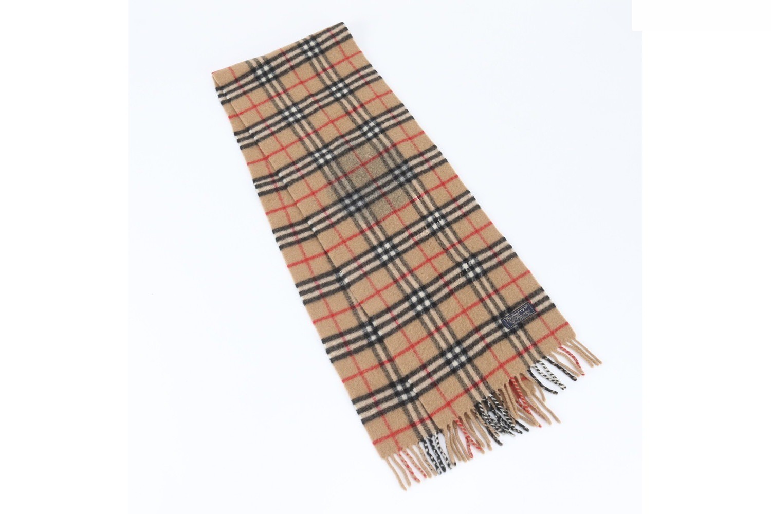 Nova Check scarf with tags attached.
