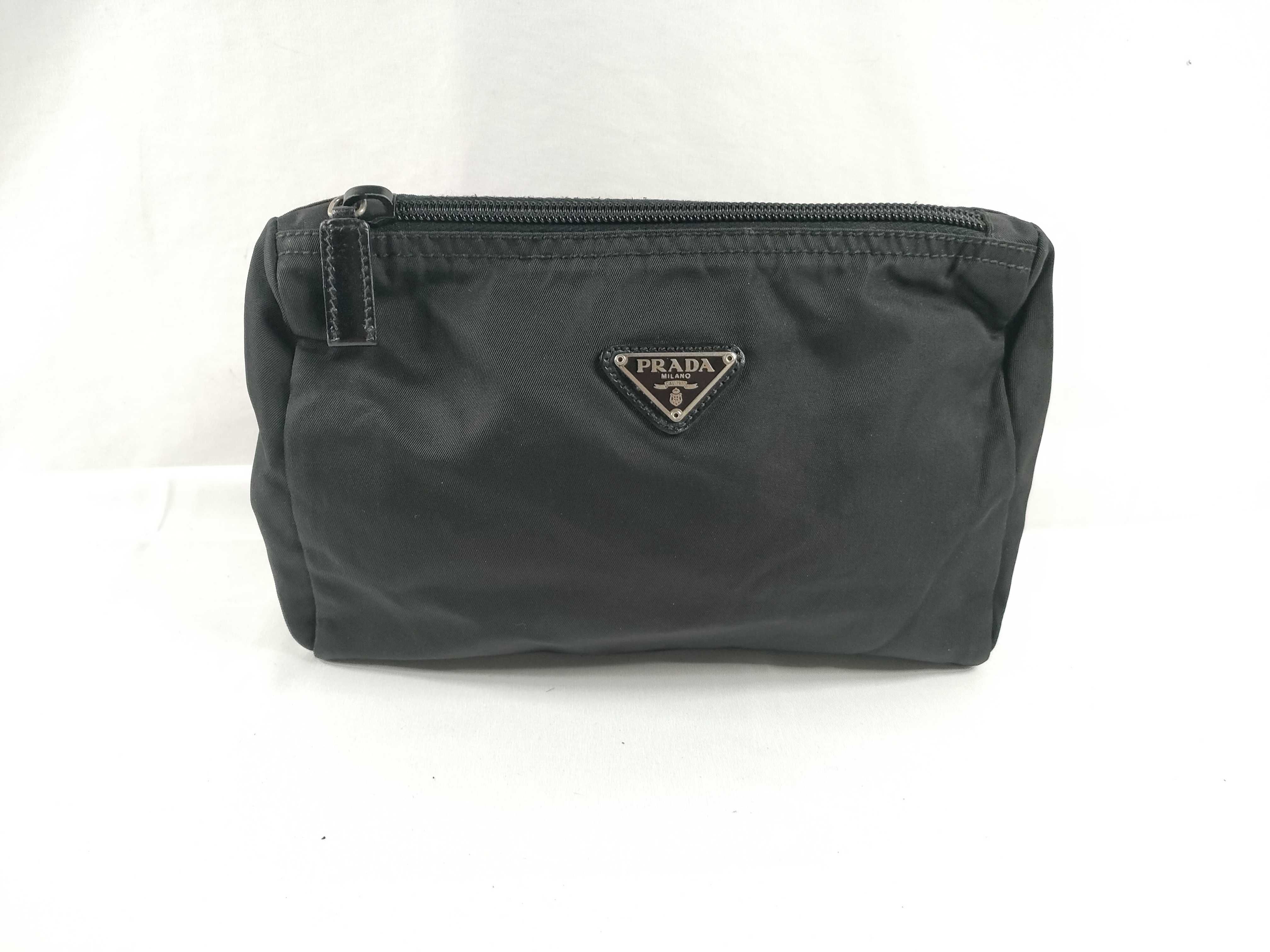 nylon pouch with triangular logo.