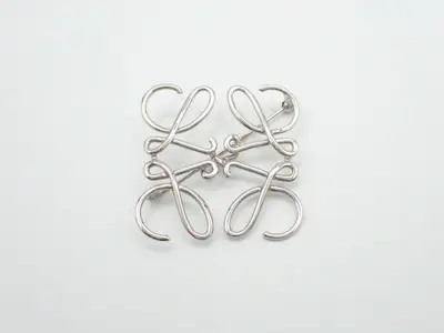 Anagram brooch, silver hardware