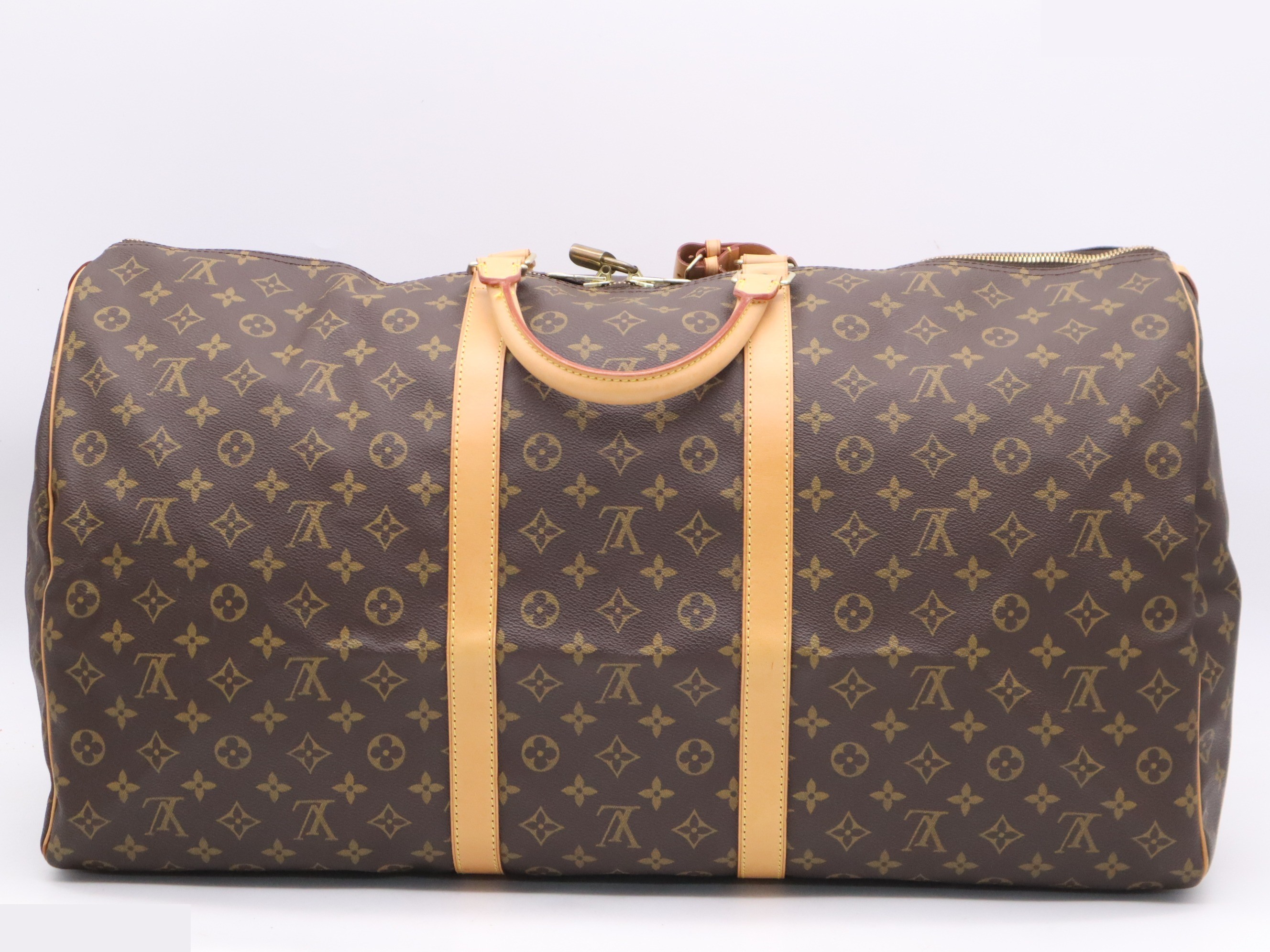 Keepall 60 with padlock, name tag, handle strap, and dust bag. — view 2
