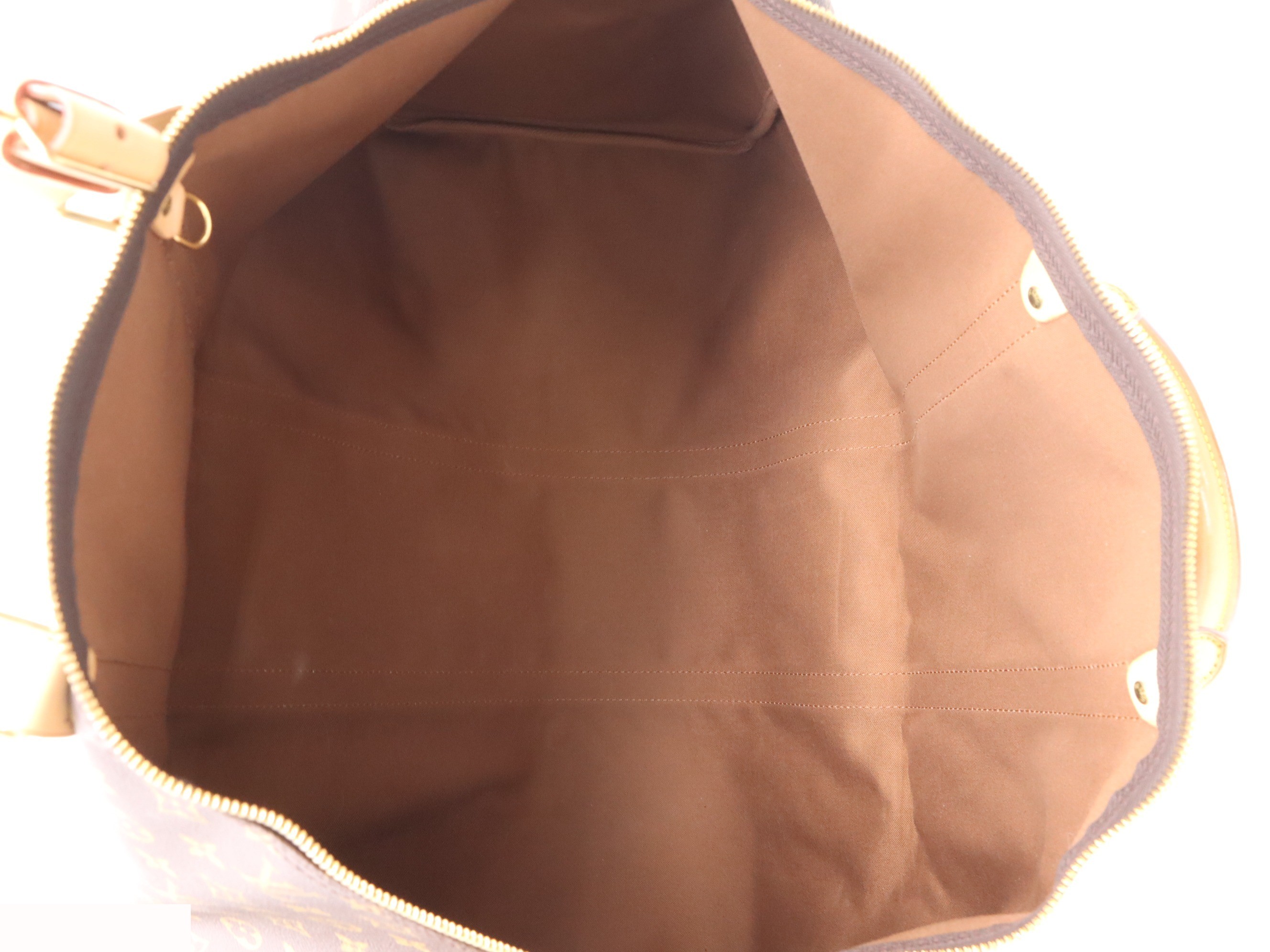 Keepall 60 with padlock, name tag, handle strap, and dust bag. — view 7