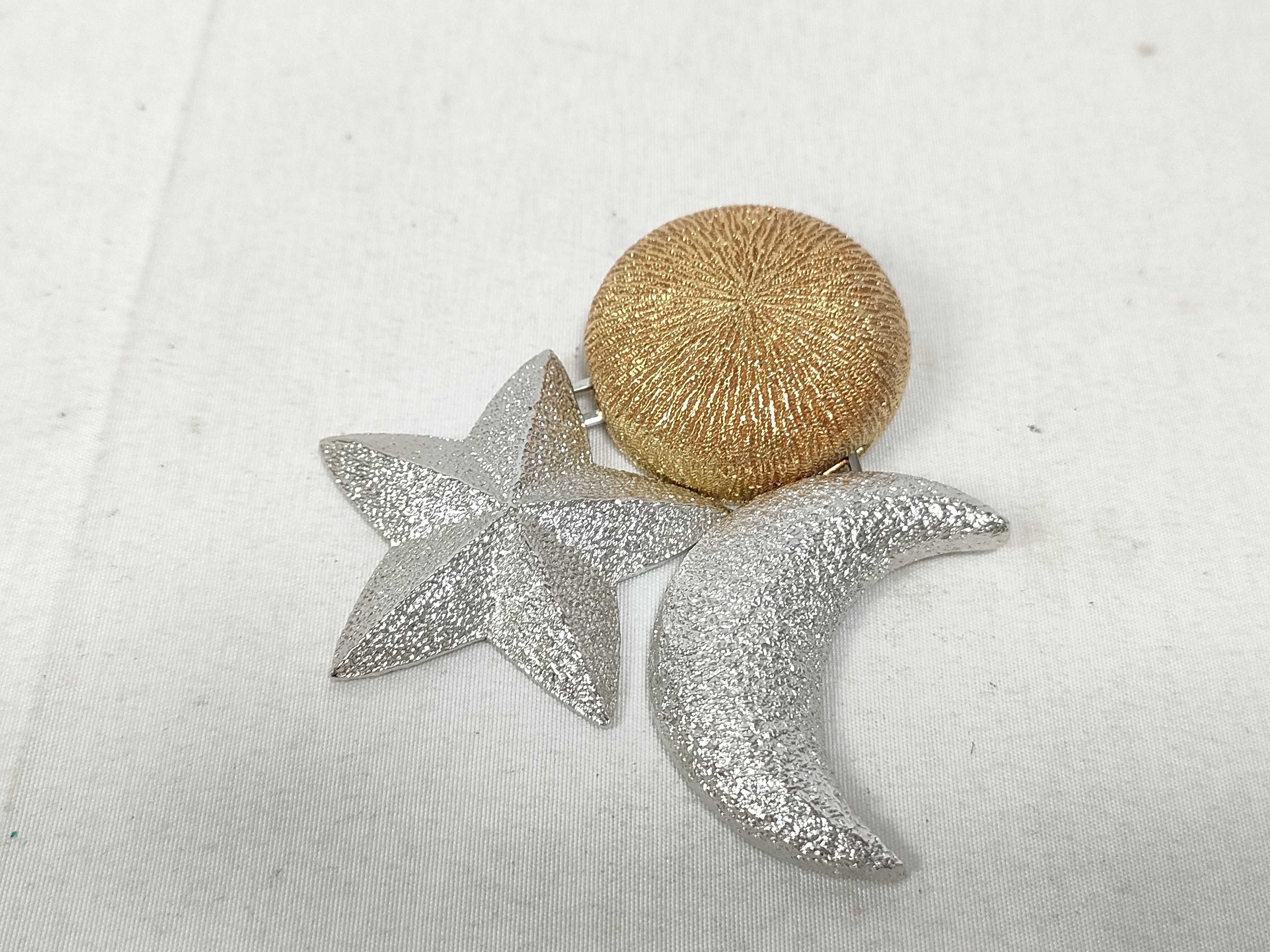 brooch, celestial body design