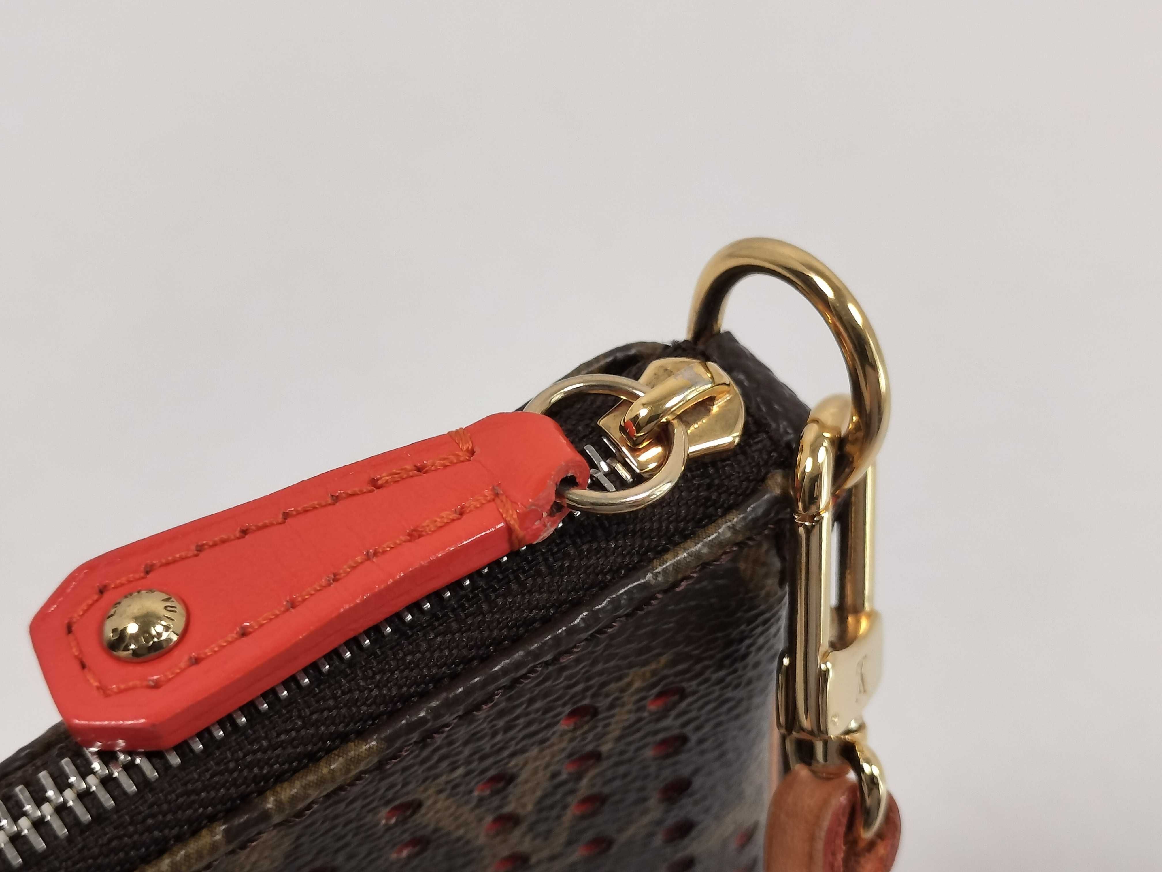 Monogram Perforated Pochette Accessoires Orange Pouch with Box — view 9