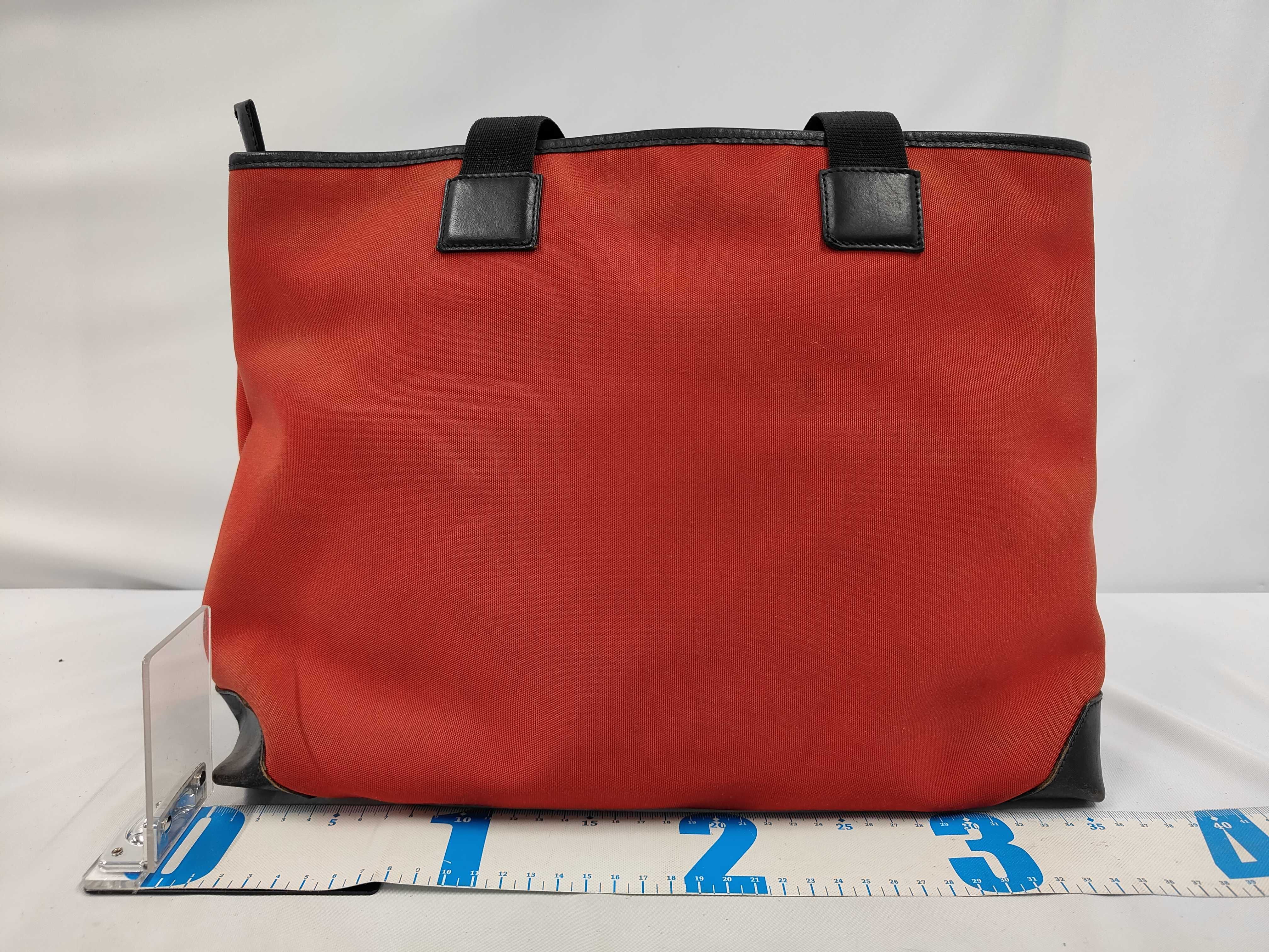 canvas and leather tote bag in black and red with a front pocket. (Item No. 019, No. 0426, No. 2404) — view 2