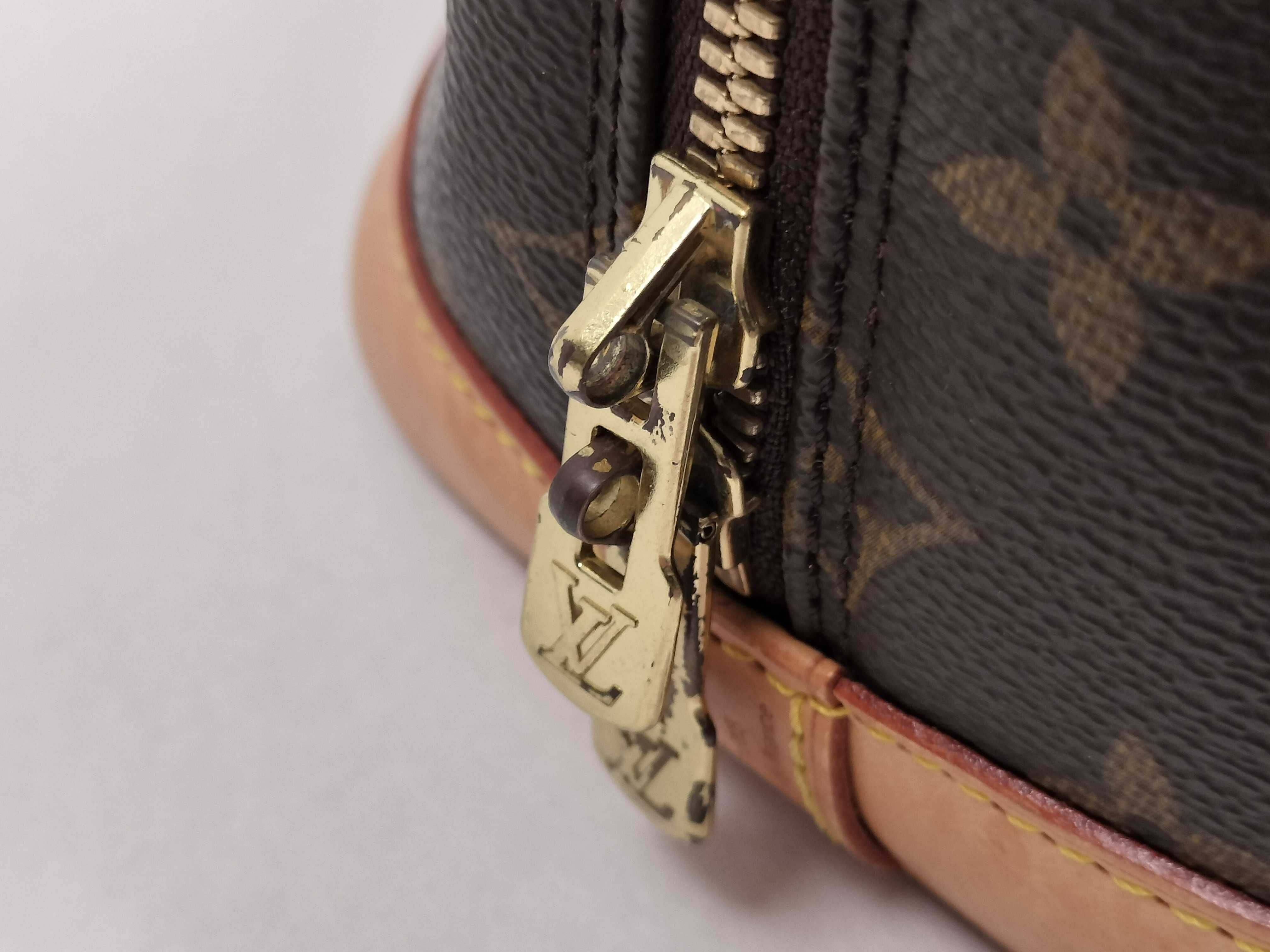 Monogram Alma M51130 Handbag — view 9