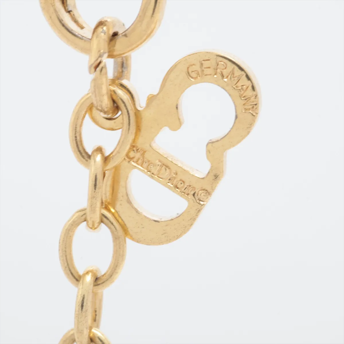 CD logo necklace, gold plated with rhinestones. Shows signs of wear, — view 4