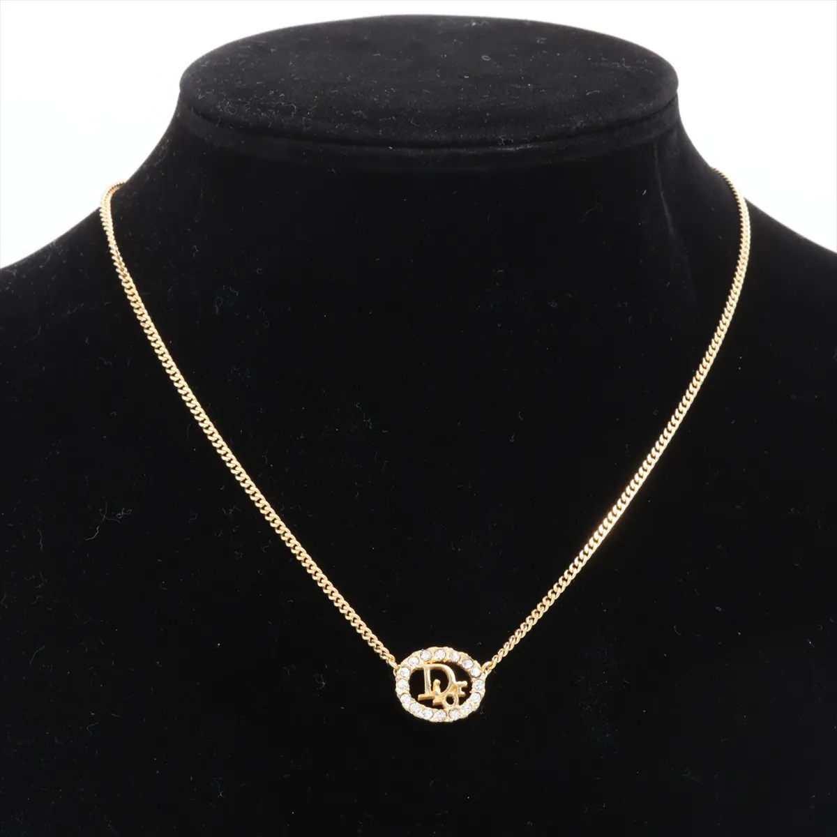 CD logo necklace, gold plated with rhinestones. Shows signs of wear, — view 5