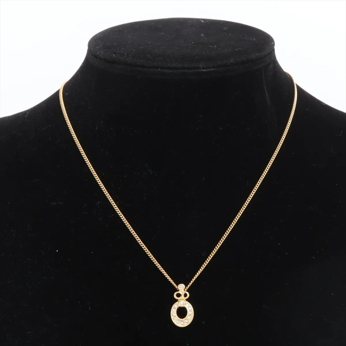 CD logo necklace, gold plated with rhinestones. Shows signs of wear, — view 5