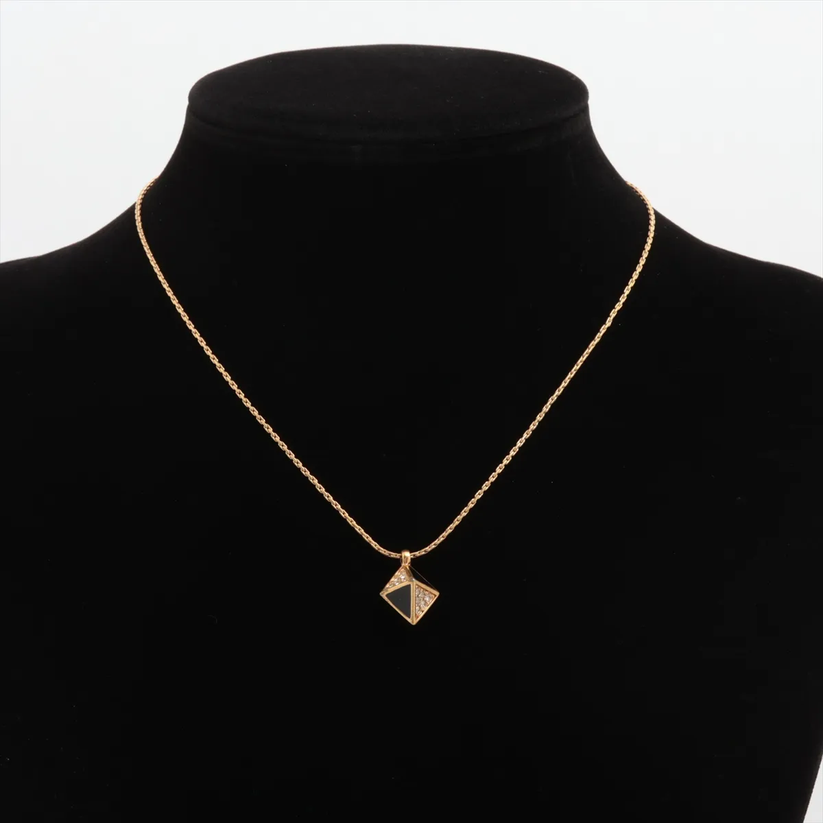 necklace, gold and black, with rhinestones. Shows signs of wear, including — view 5