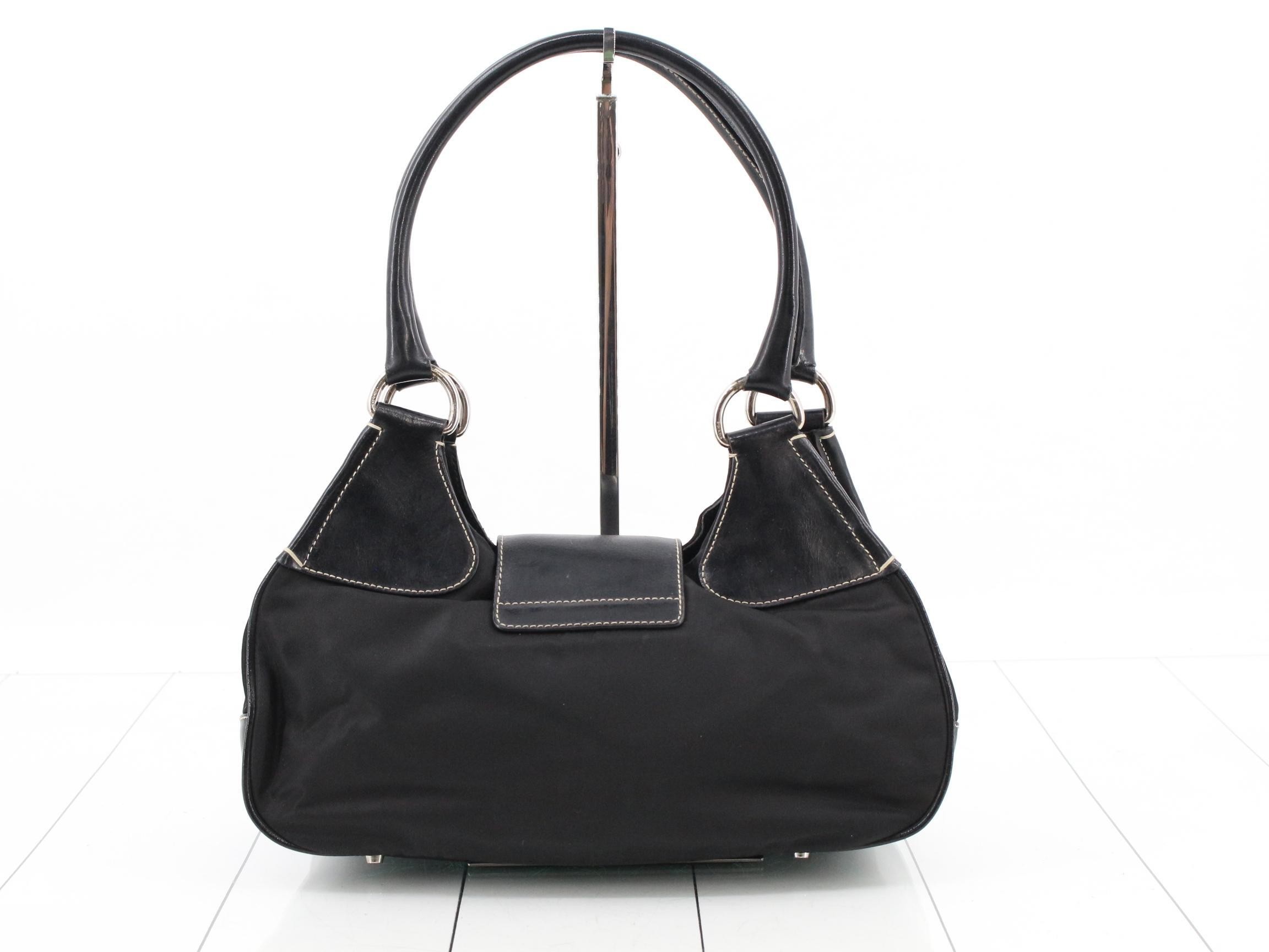Leather and nylon shoulder bag with triangular logo. — view 2