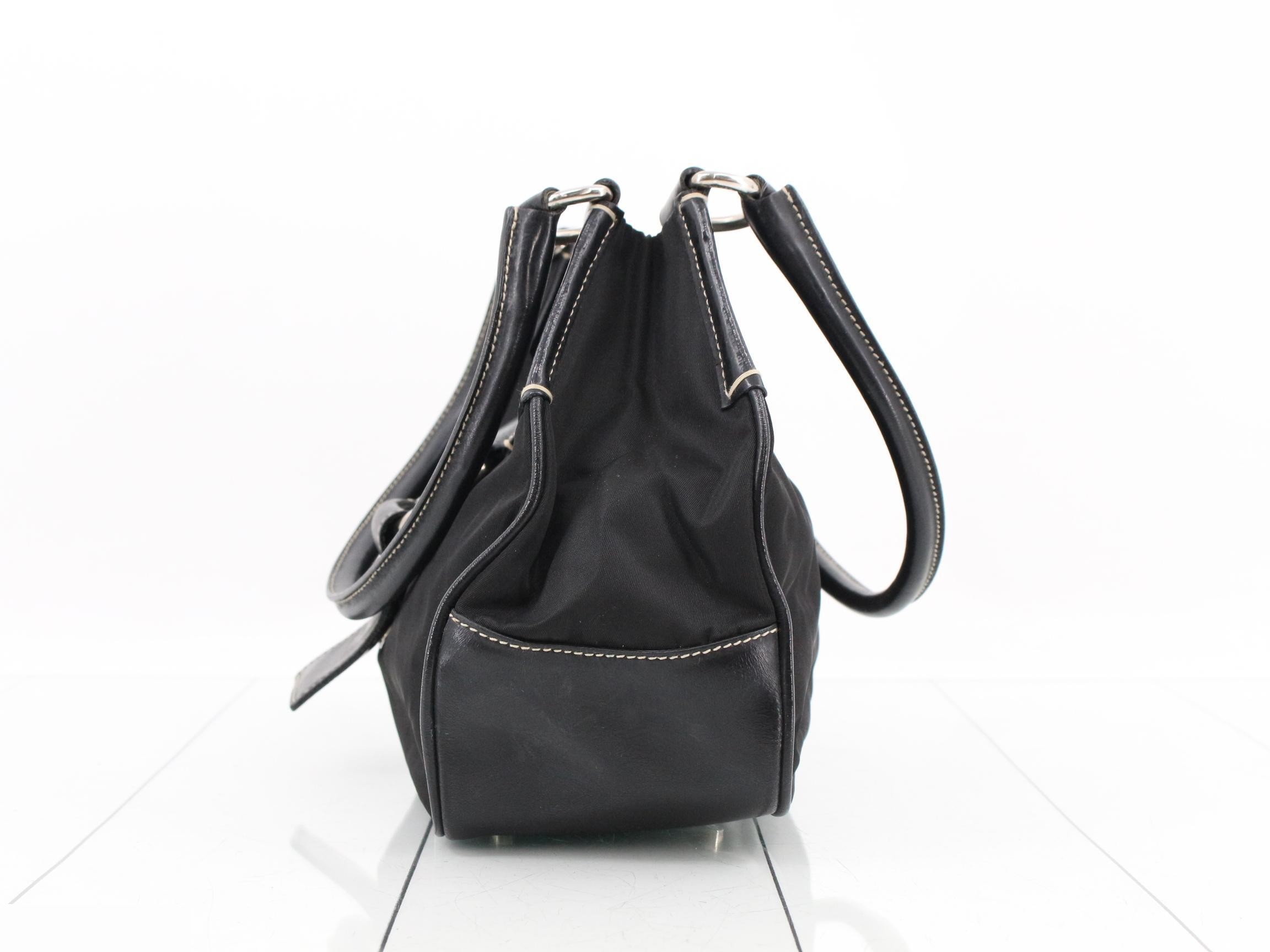 Leather and nylon shoulder bag with triangular logo. — view 3