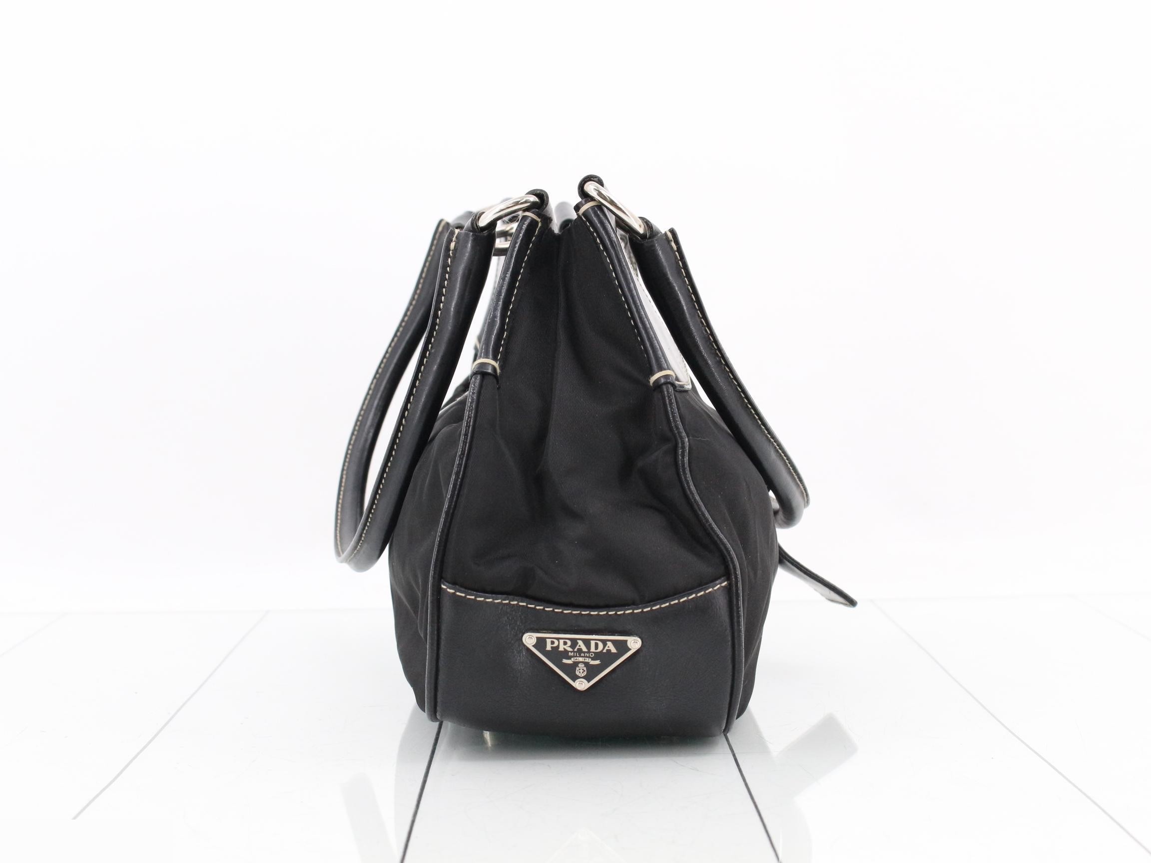 Leather and nylon shoulder bag with triangular logo. — view 4
