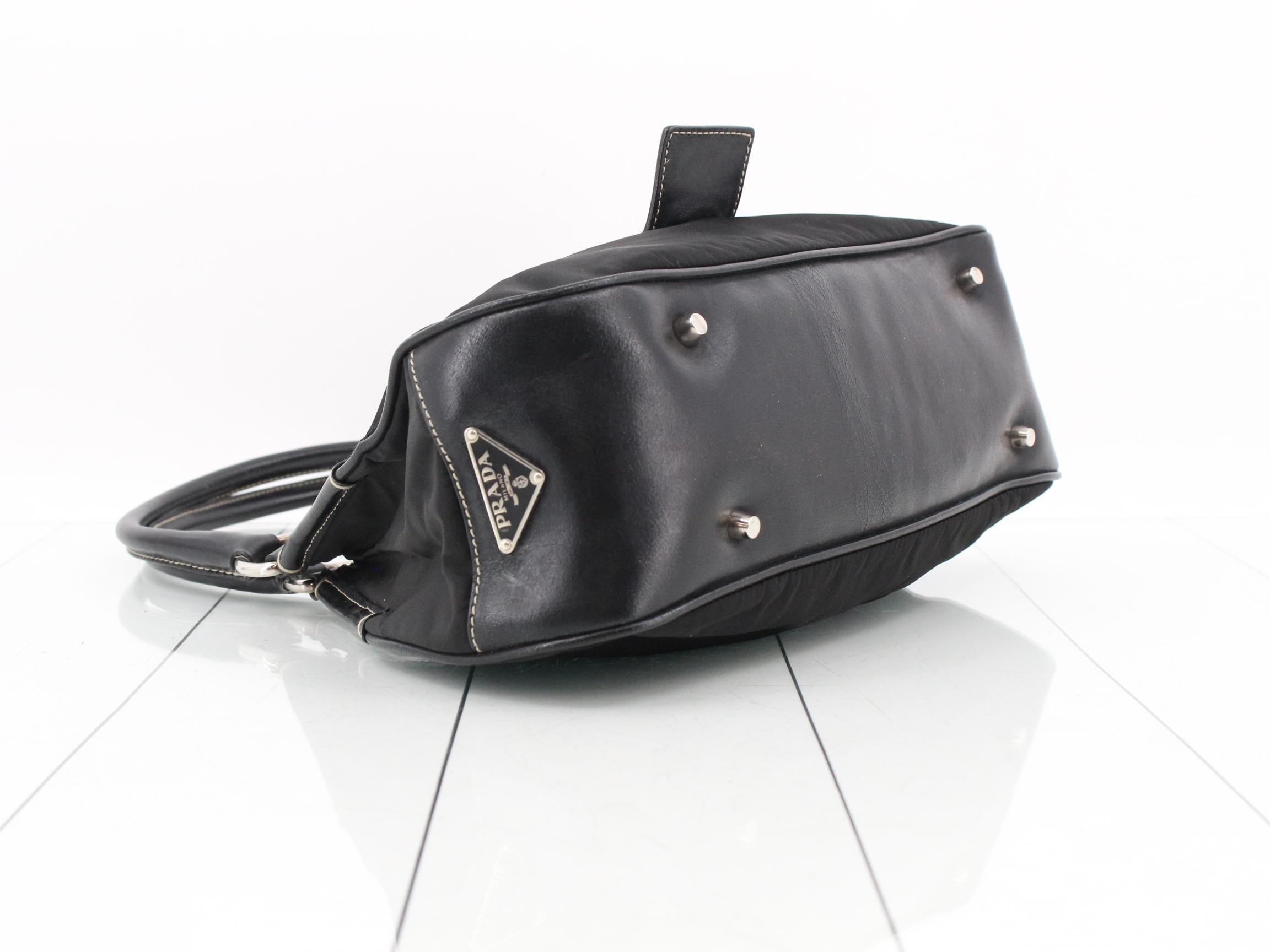 Leather and nylon shoulder bag with triangular logo. — view 5