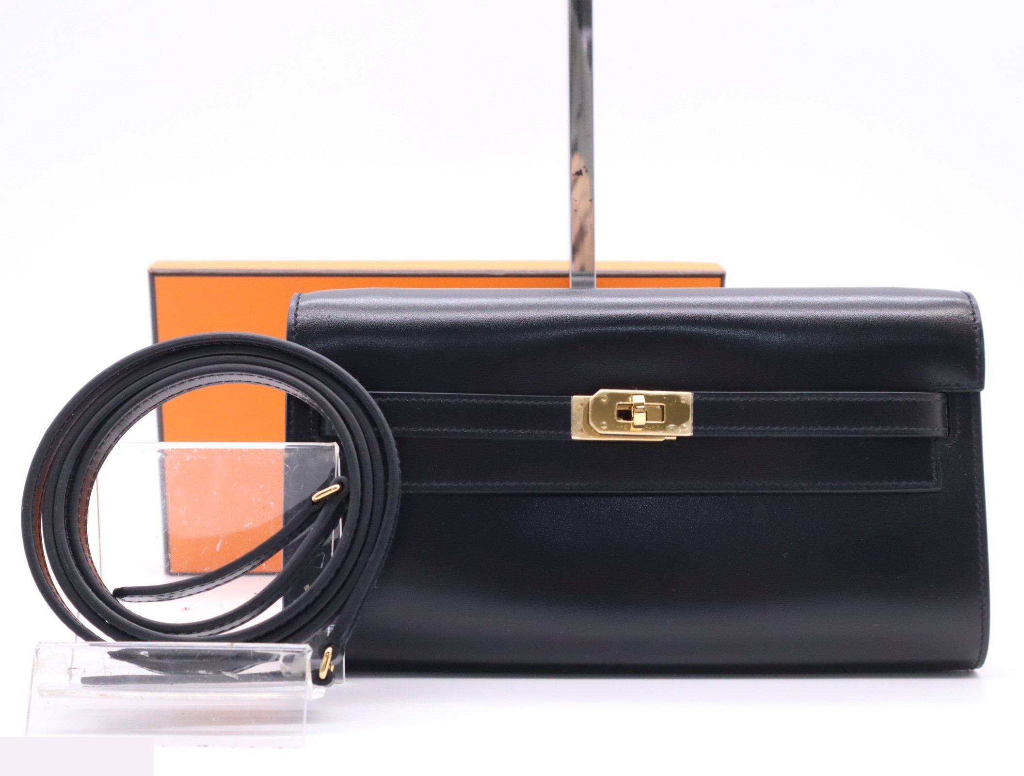 Leather Kelly To Go bag, includes shoulder strap, small dust bag, and box.