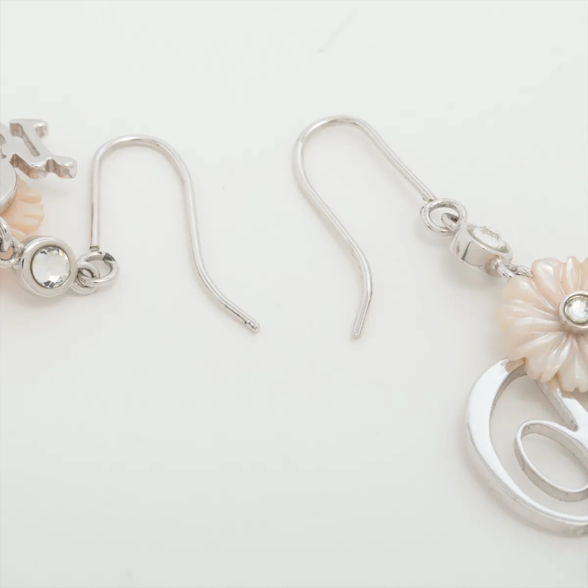 logo earrings (for both ears), metal and rhinestone, silver. Shows signs of wear: — view 4