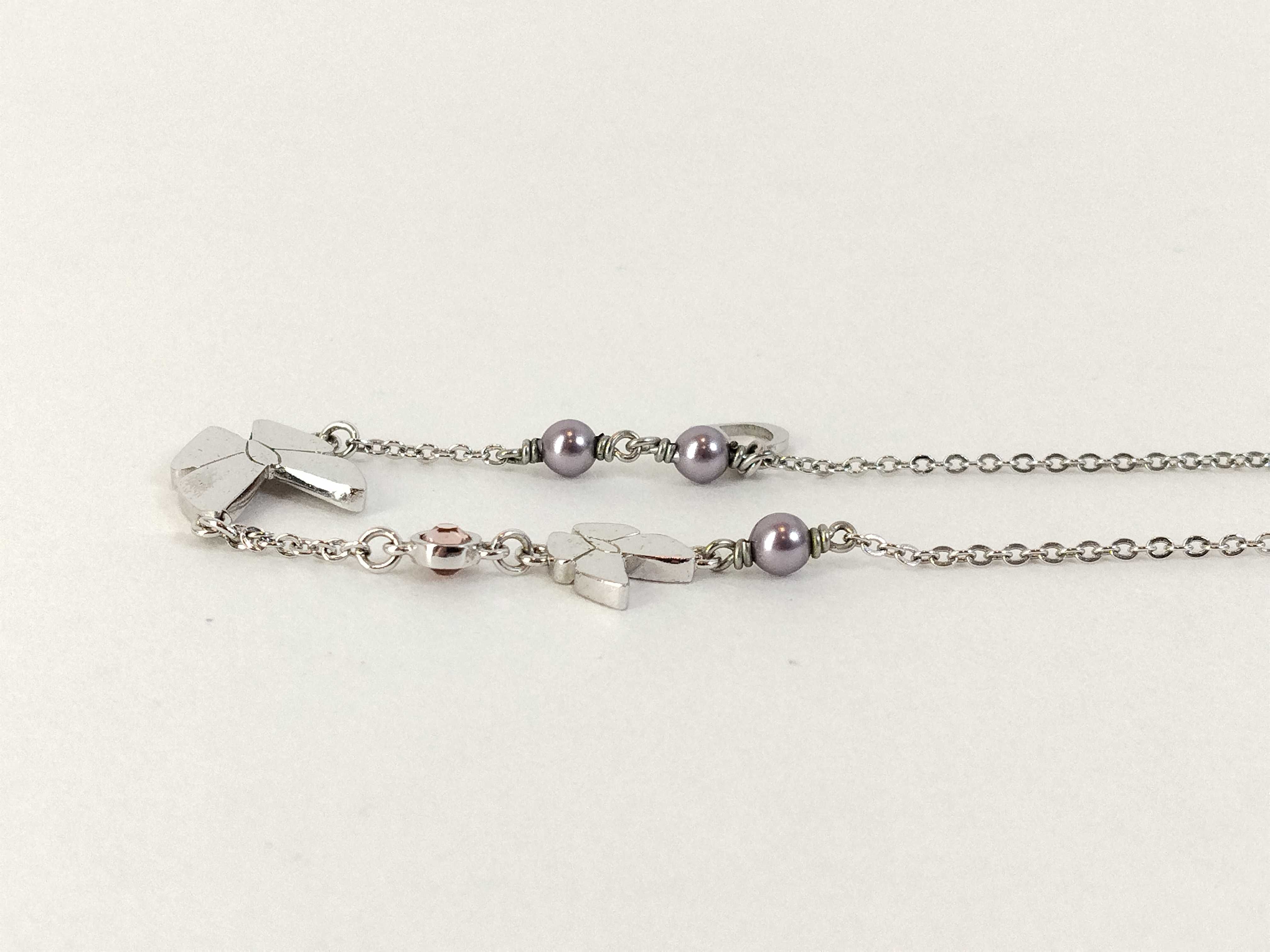 silver-colored butterfly motif necklace — view 5