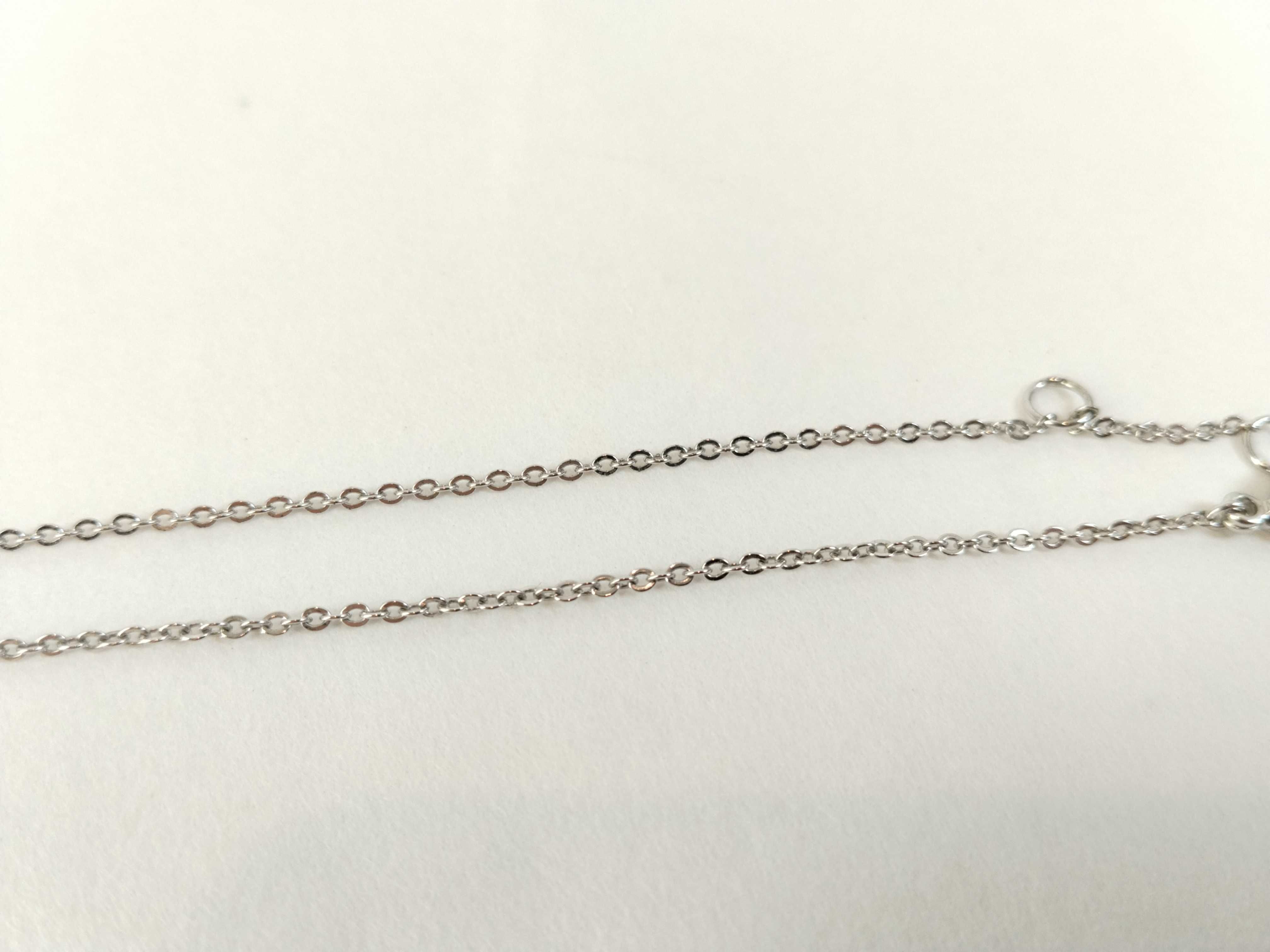 silver-colored butterfly motif necklace — view 7
