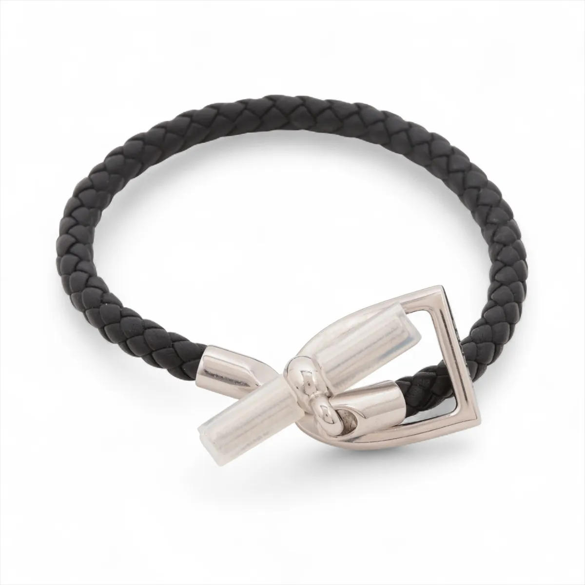 Etrier bracelet, metal and leather, black and silver. Shows signs of wear,