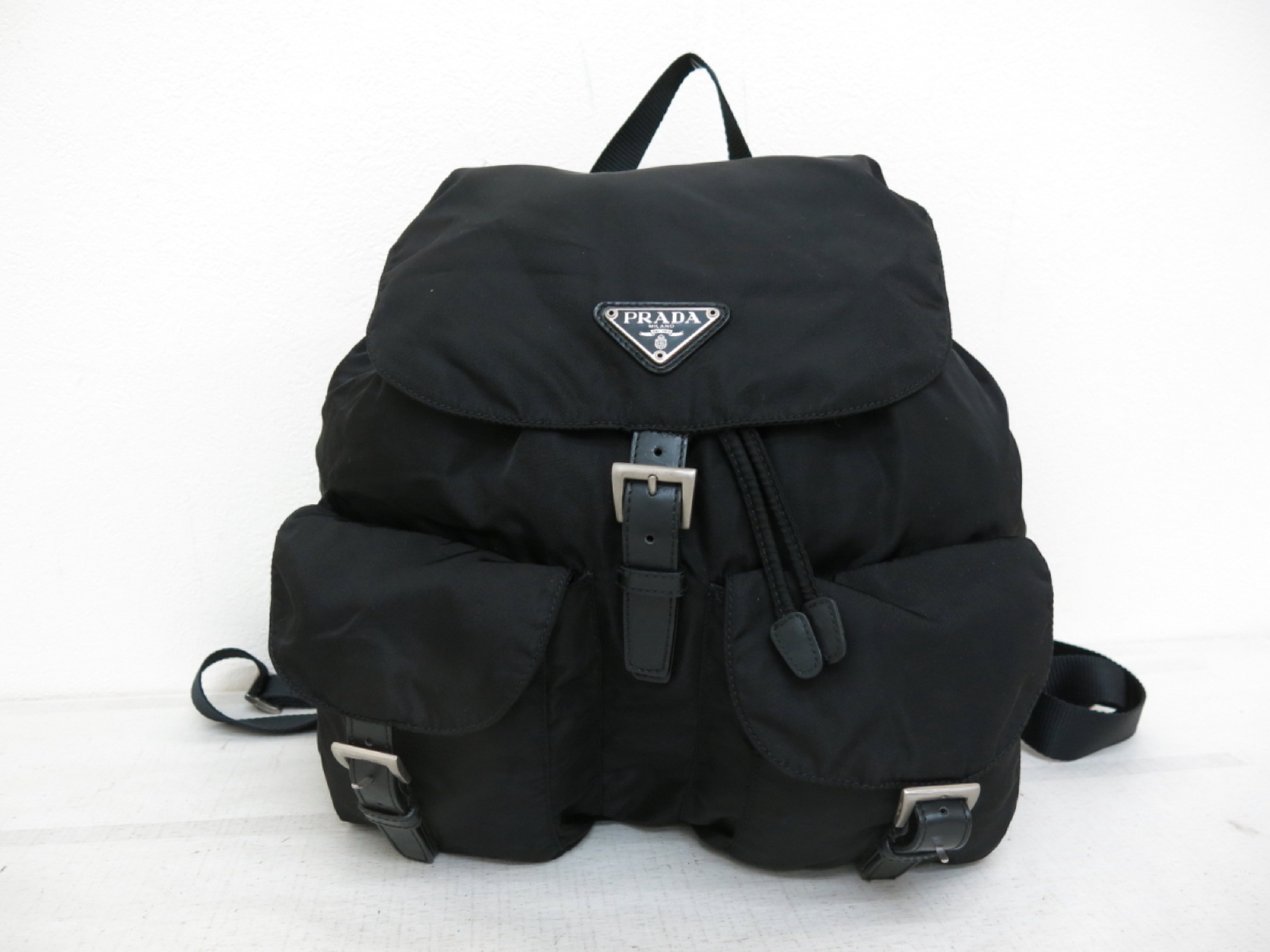 Triangle Logo Plate Nylon Calfskin Backpack Black