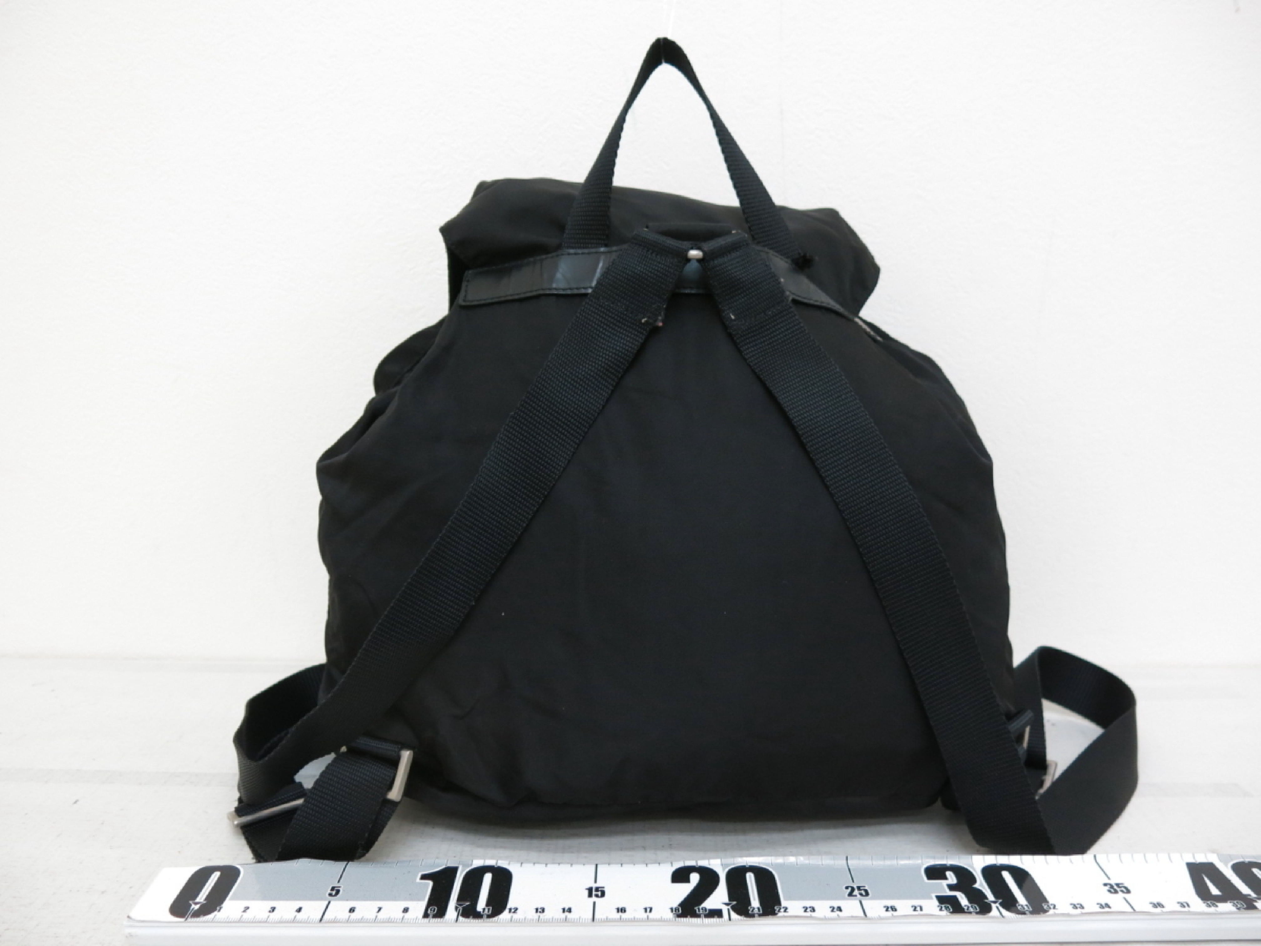 Triangle Logo Plate Nylon Calfskin Backpack Black — view 2