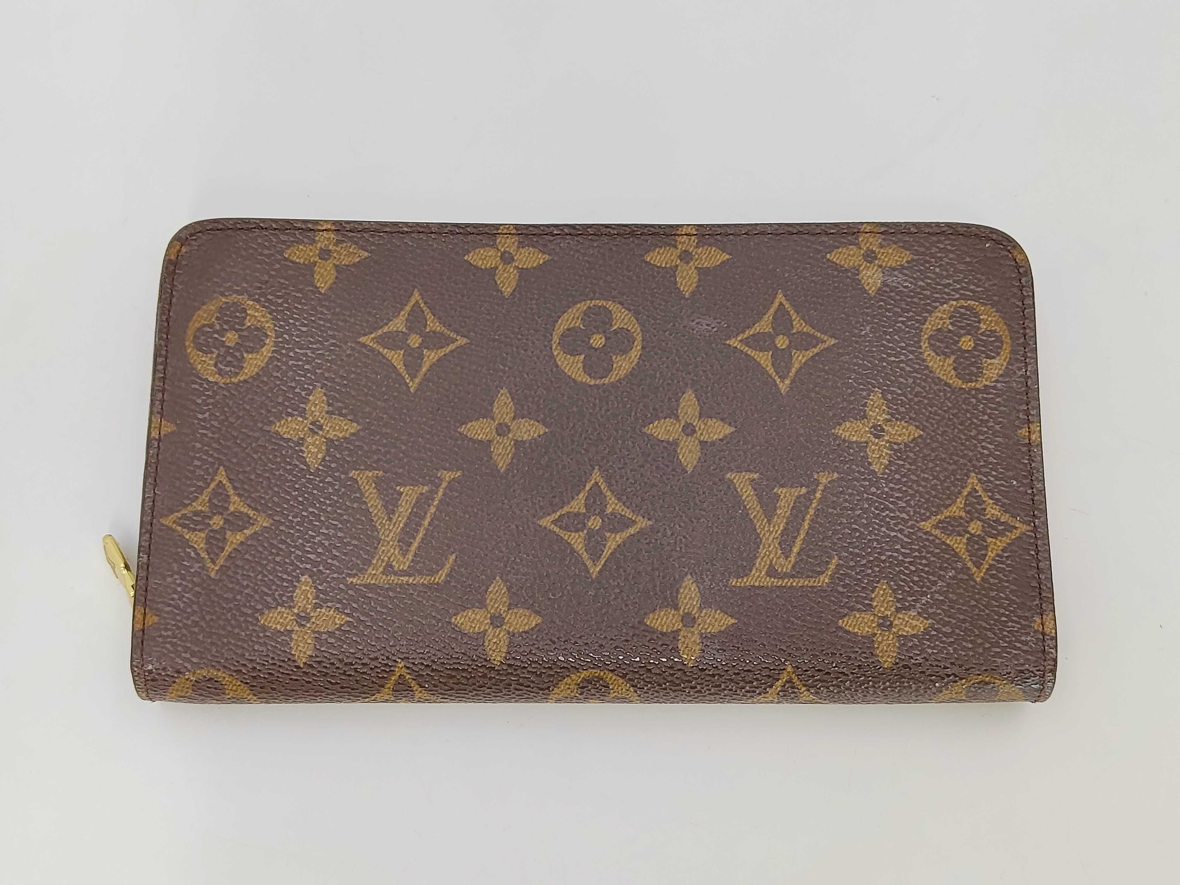 Monogram Mahina brand bag wallet