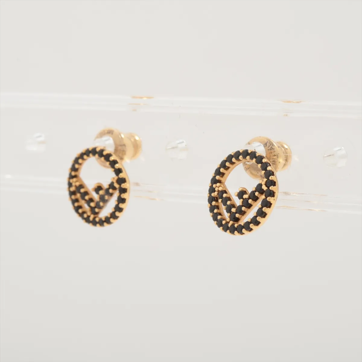 F is Fendi earrings (for both ears), gold and black with rhinestones. Shows signs of wear: — view 3