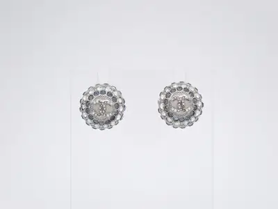 Earrings with Coco Mark design and blue stones