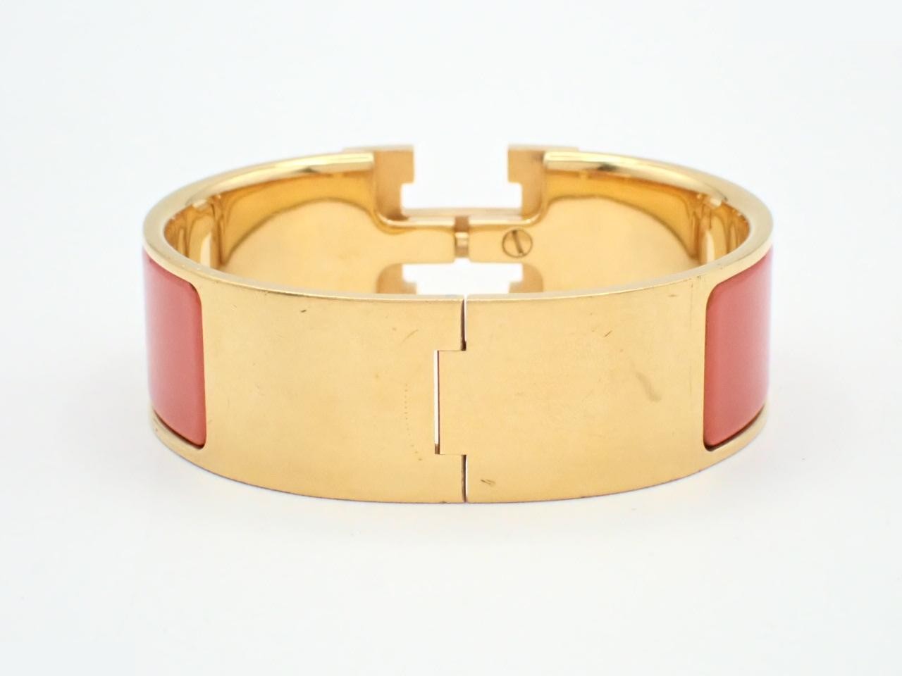 Gold bracelet/bangle, orange color, wrist circumference approximately 17cm — view 2