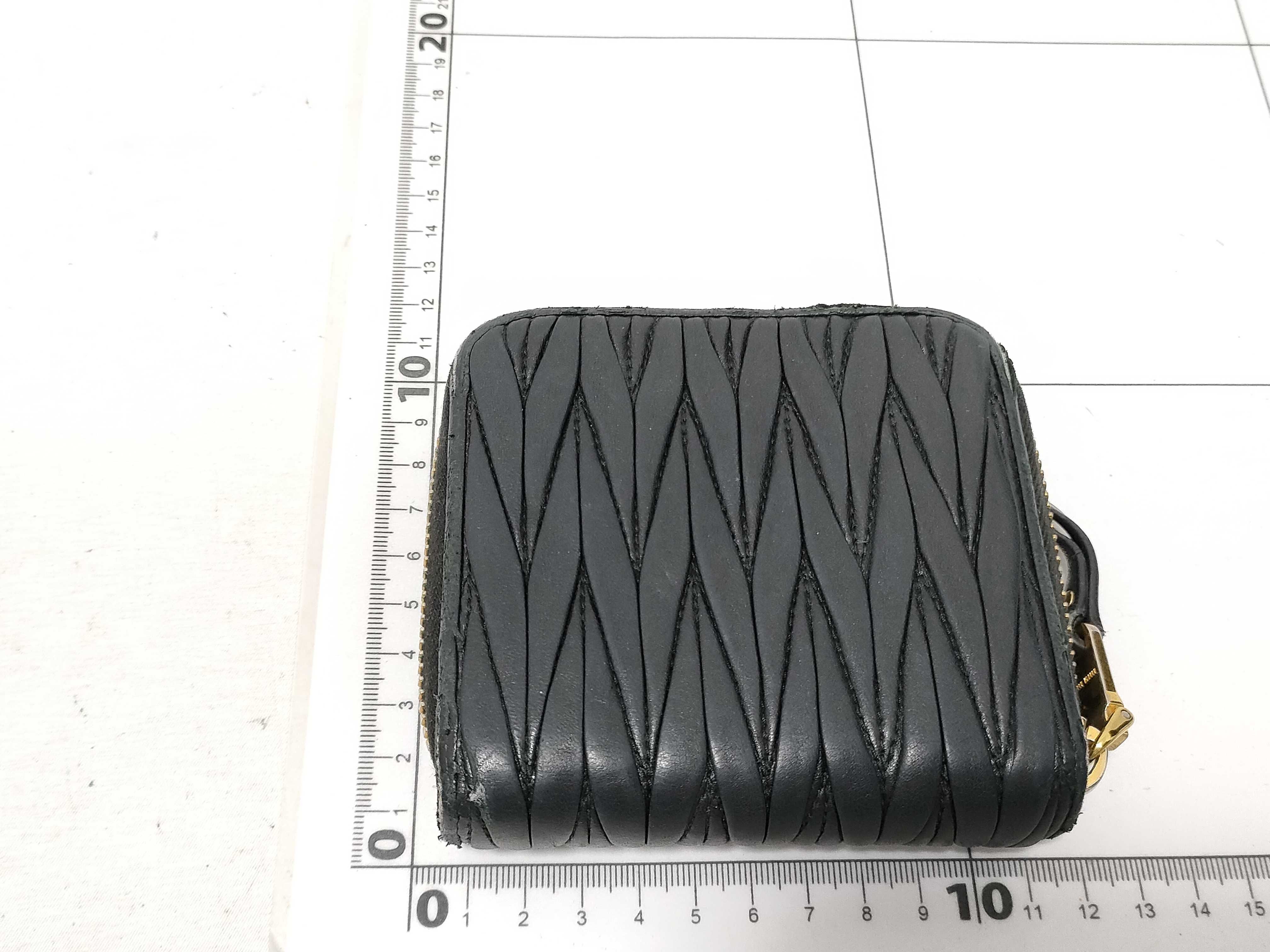 Matelassé Leather Round Zip Bi-fold Wallet — view 2