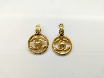 earrings, gold circle shape, with original box.