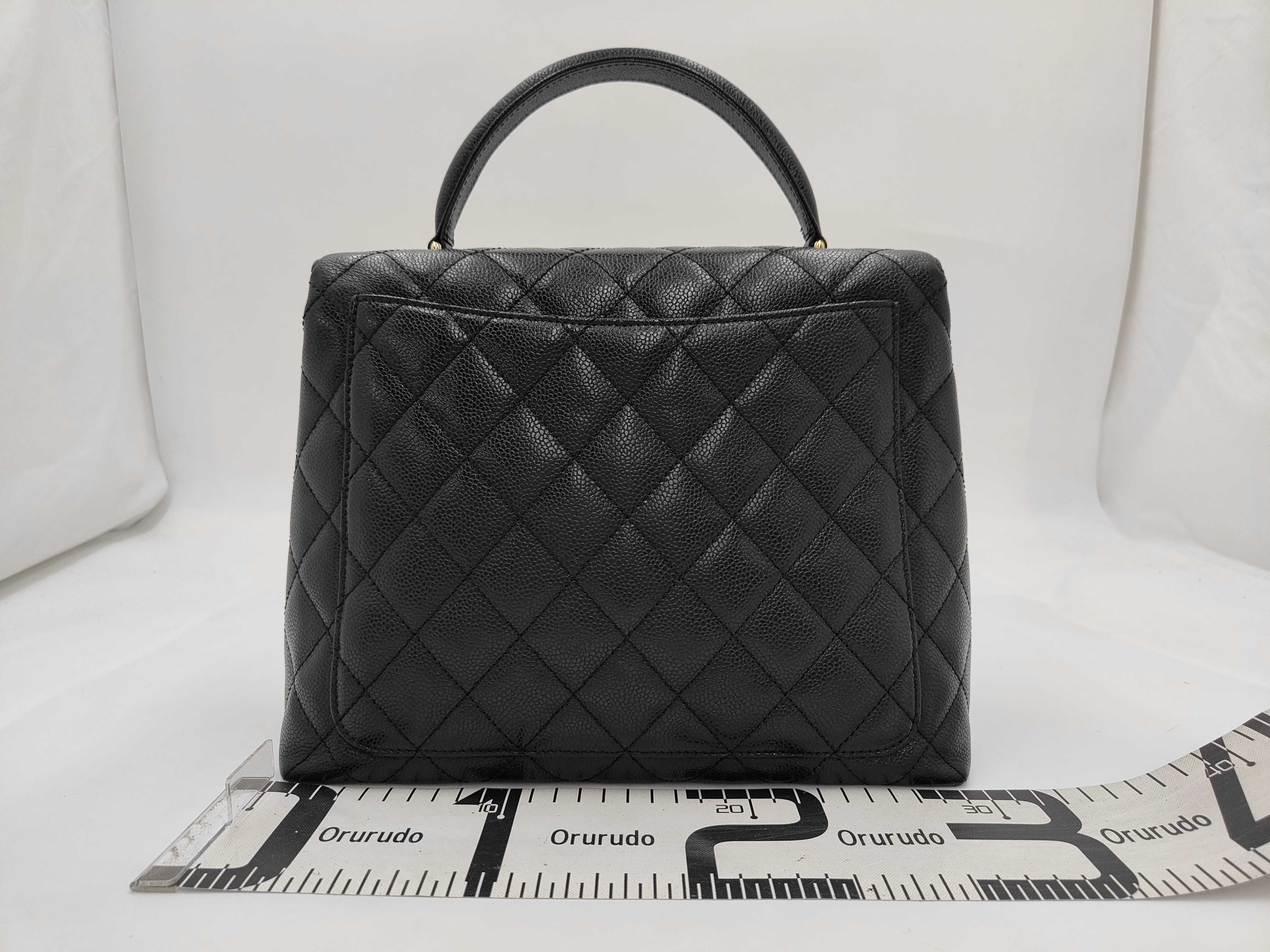 Matelassé Caviar Leather Top Handle Handbag, Black, with Authenticity Card and Seal. — view 2
