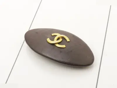 Coco Mark Leather Barrette with Embossed Design and Gold Hardware