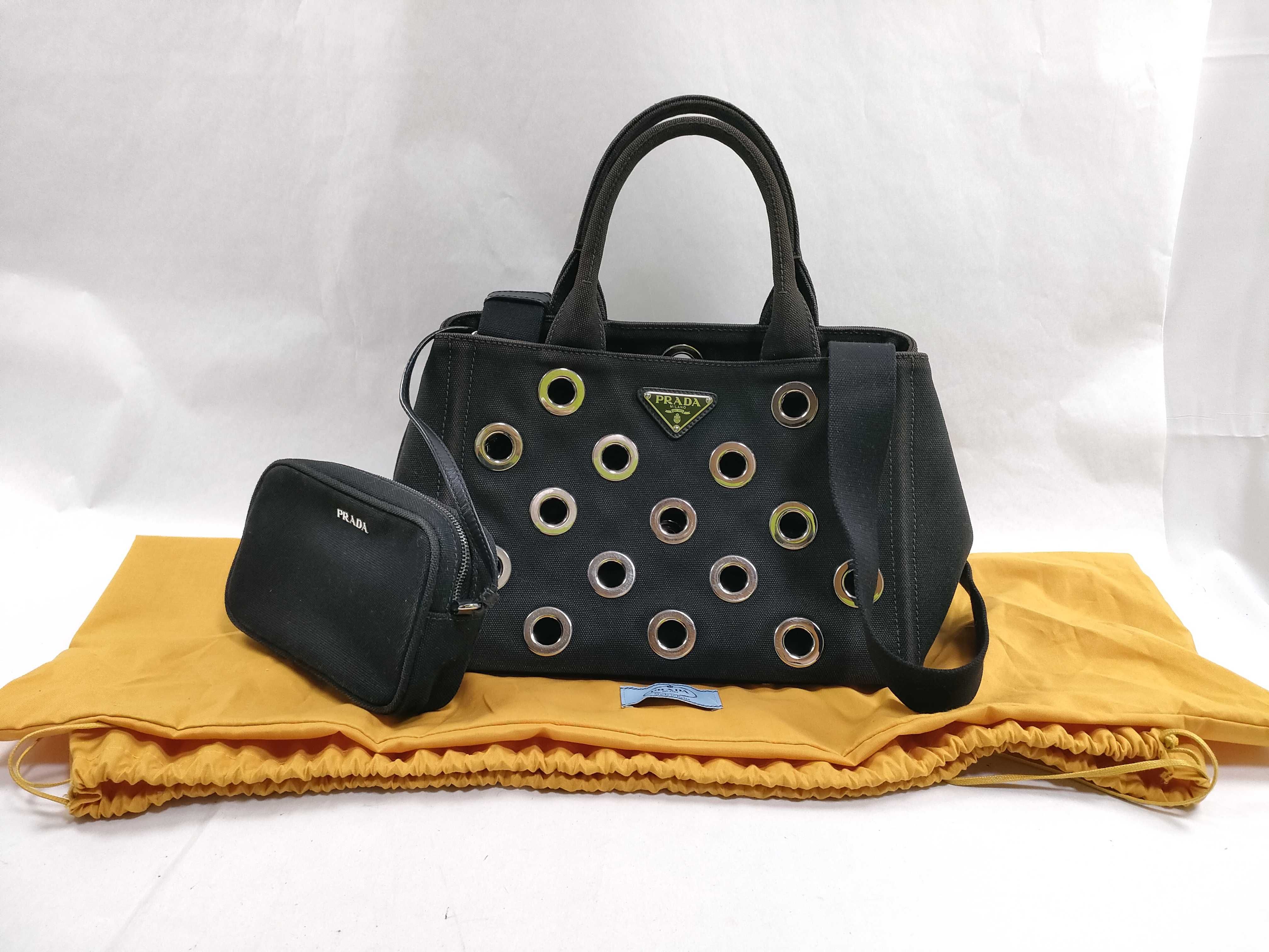 1BG439 Canapa Silver Grommet Handbag