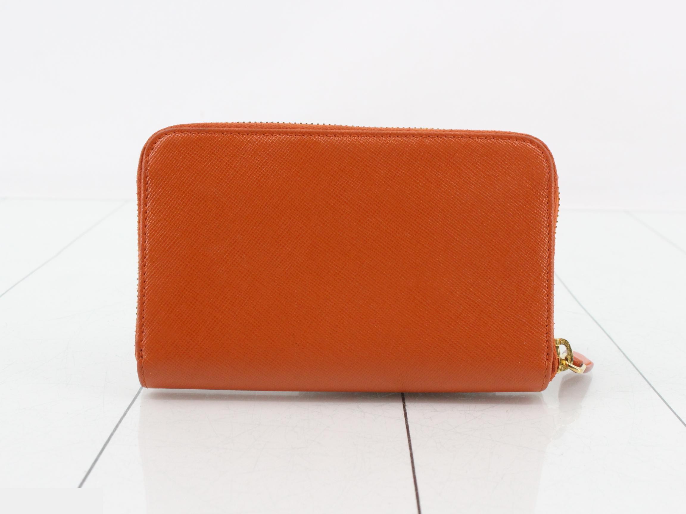 Saffiano leather, round zipper, medium-length wallet, gold hardware, with warranty card, half tag, and box. — view 2