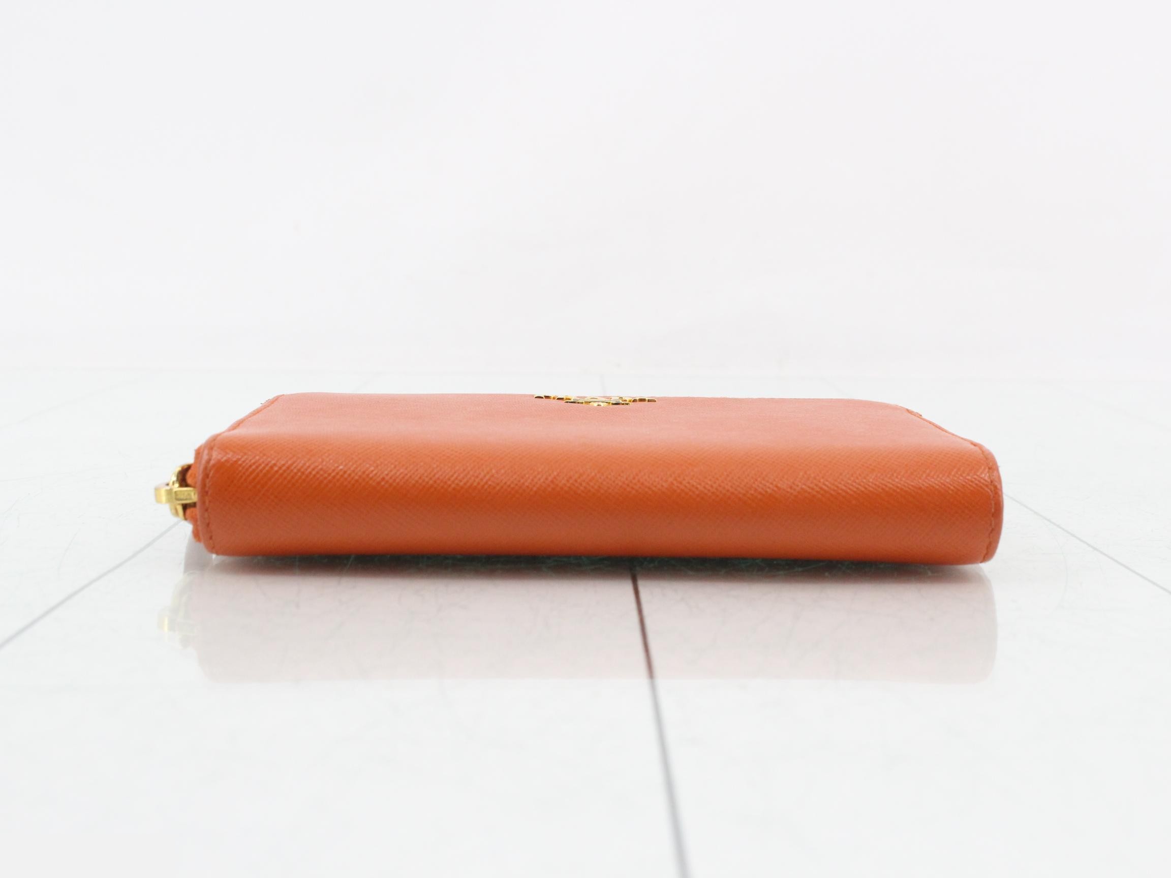 Saffiano leather, round zipper, medium-length wallet, gold hardware, with warranty card, half tag, and box. — view 3