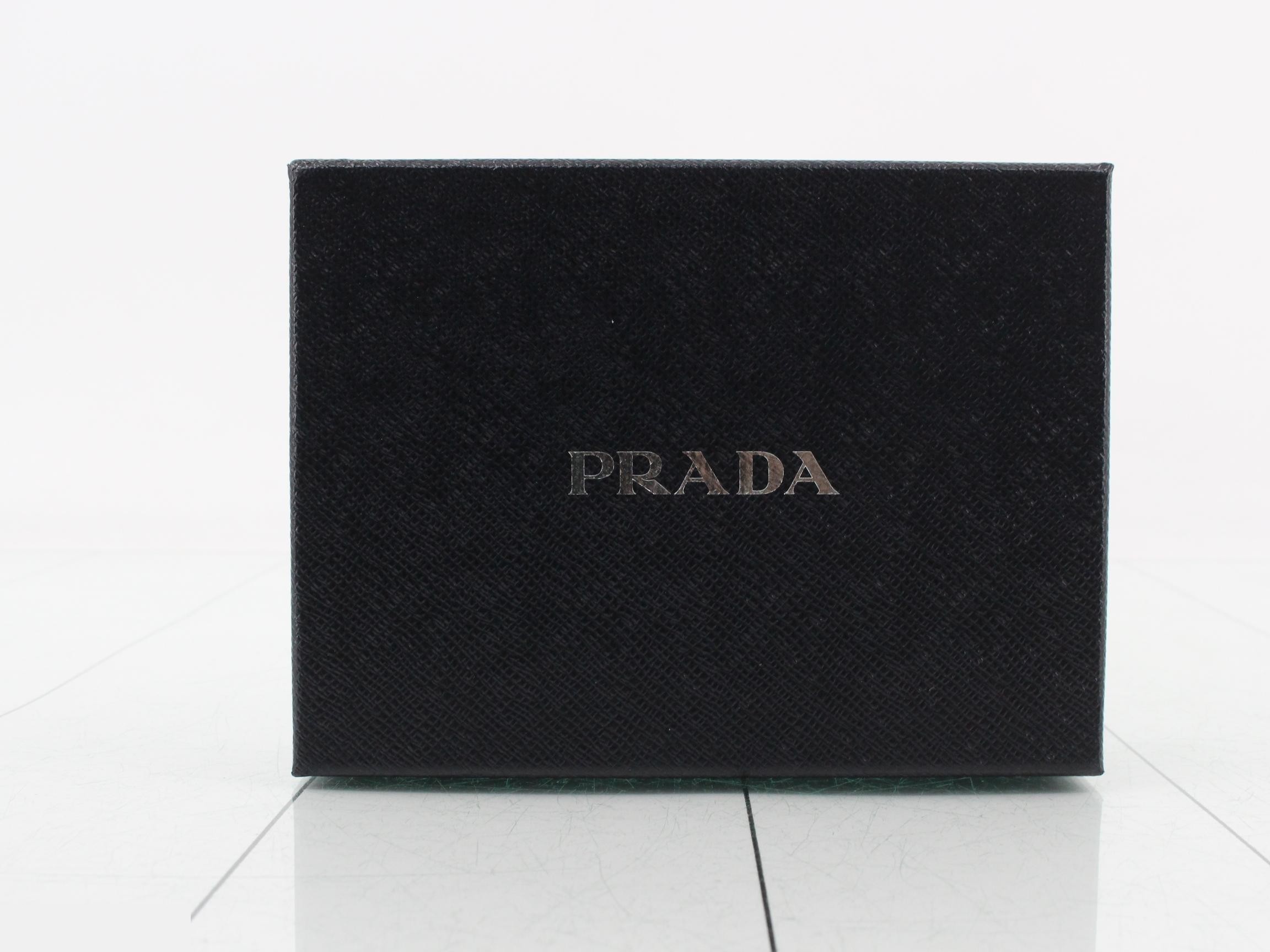 Saffiano leather, round zipper, medium-length wallet, gold hardware, with warranty card, half tag, and box. — view 5