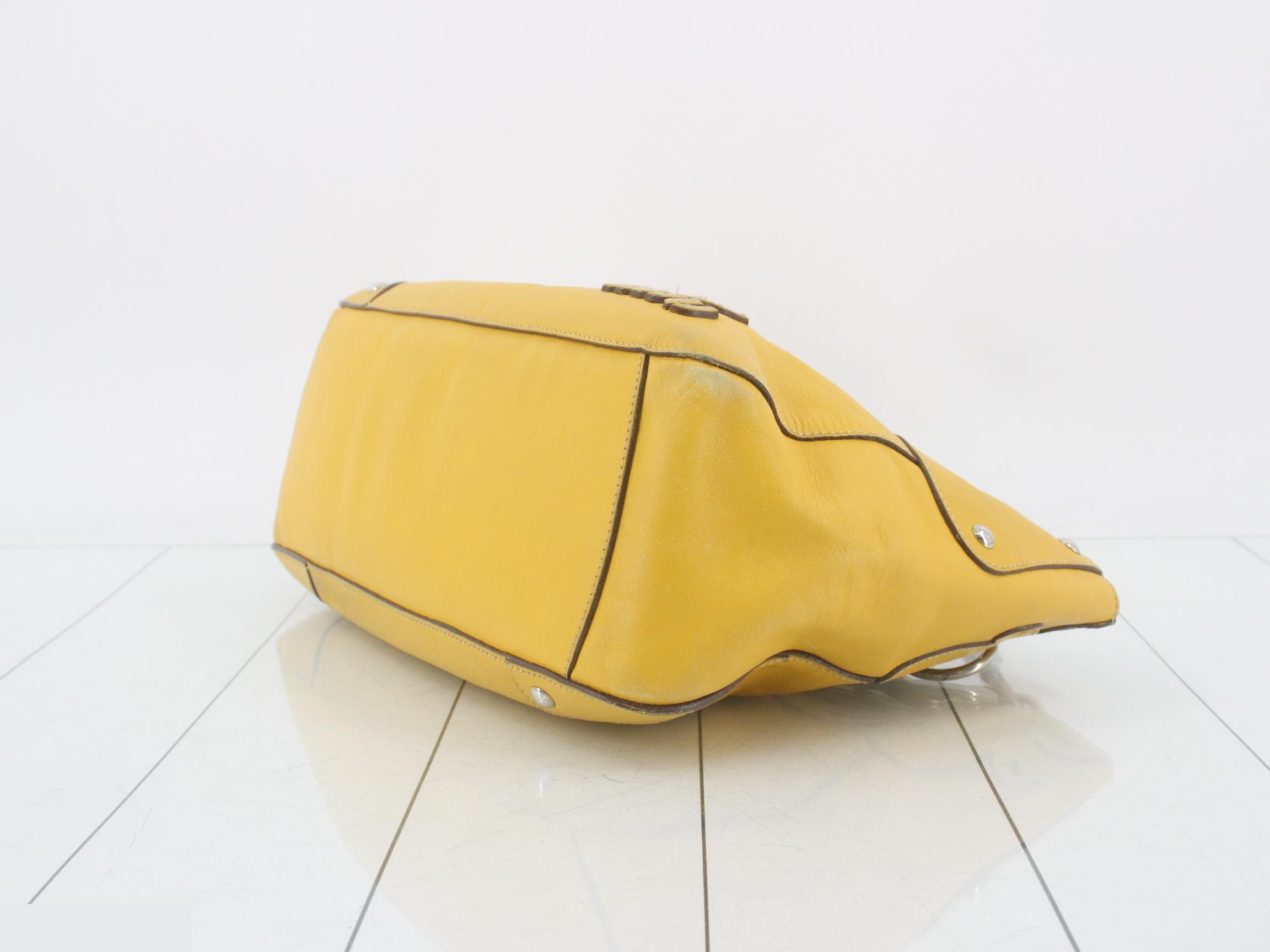 Leather semi-shoulder bag with flower motif and brand logo, yellow tones. — view 6
